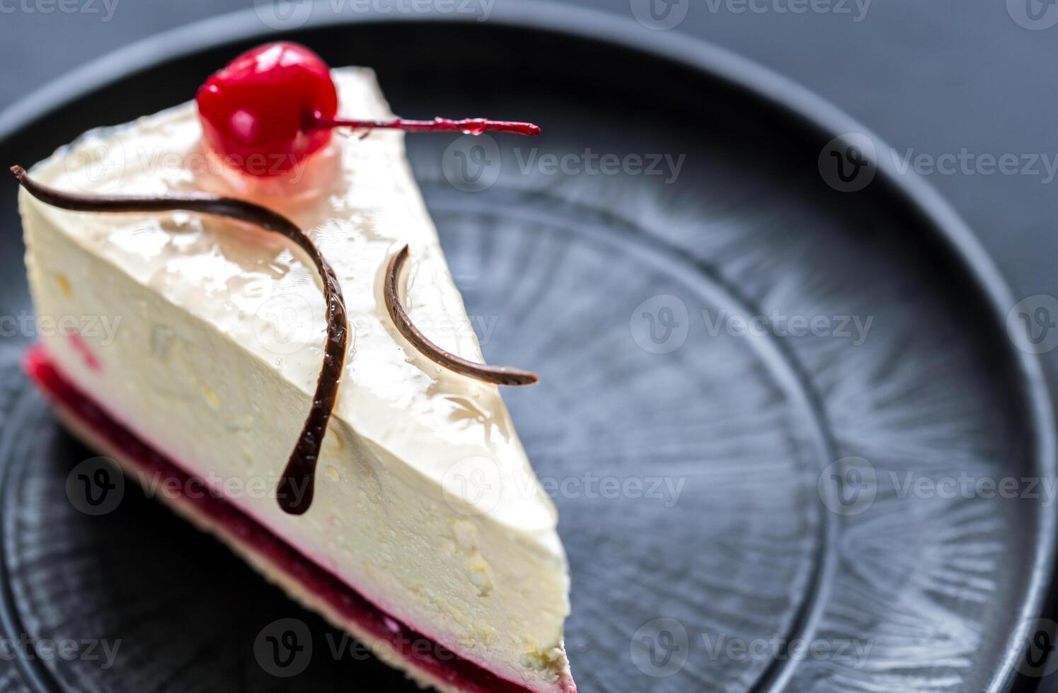 Raspberry cheesecake with sweet cherry photo