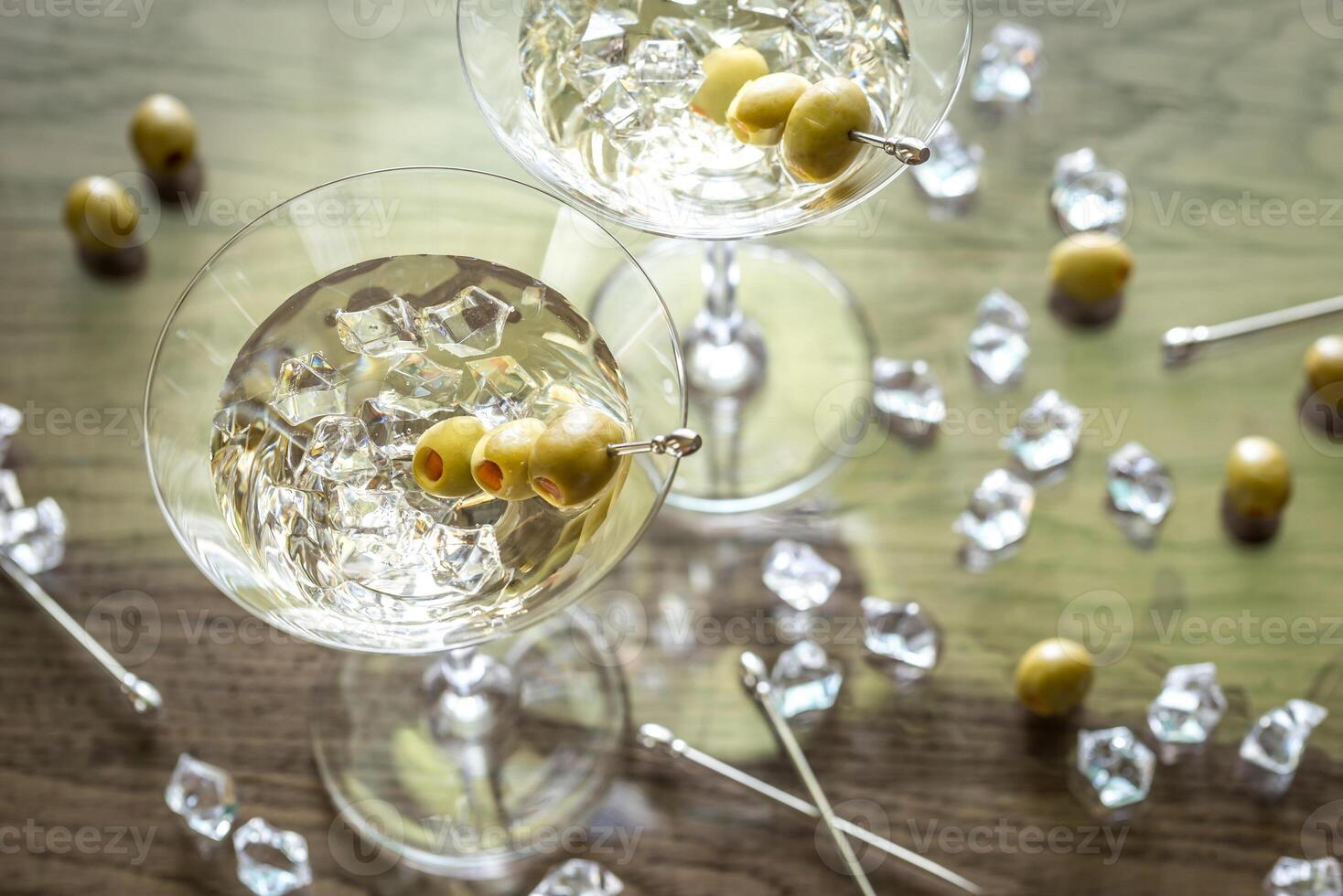 Two olive martini cocktails photo