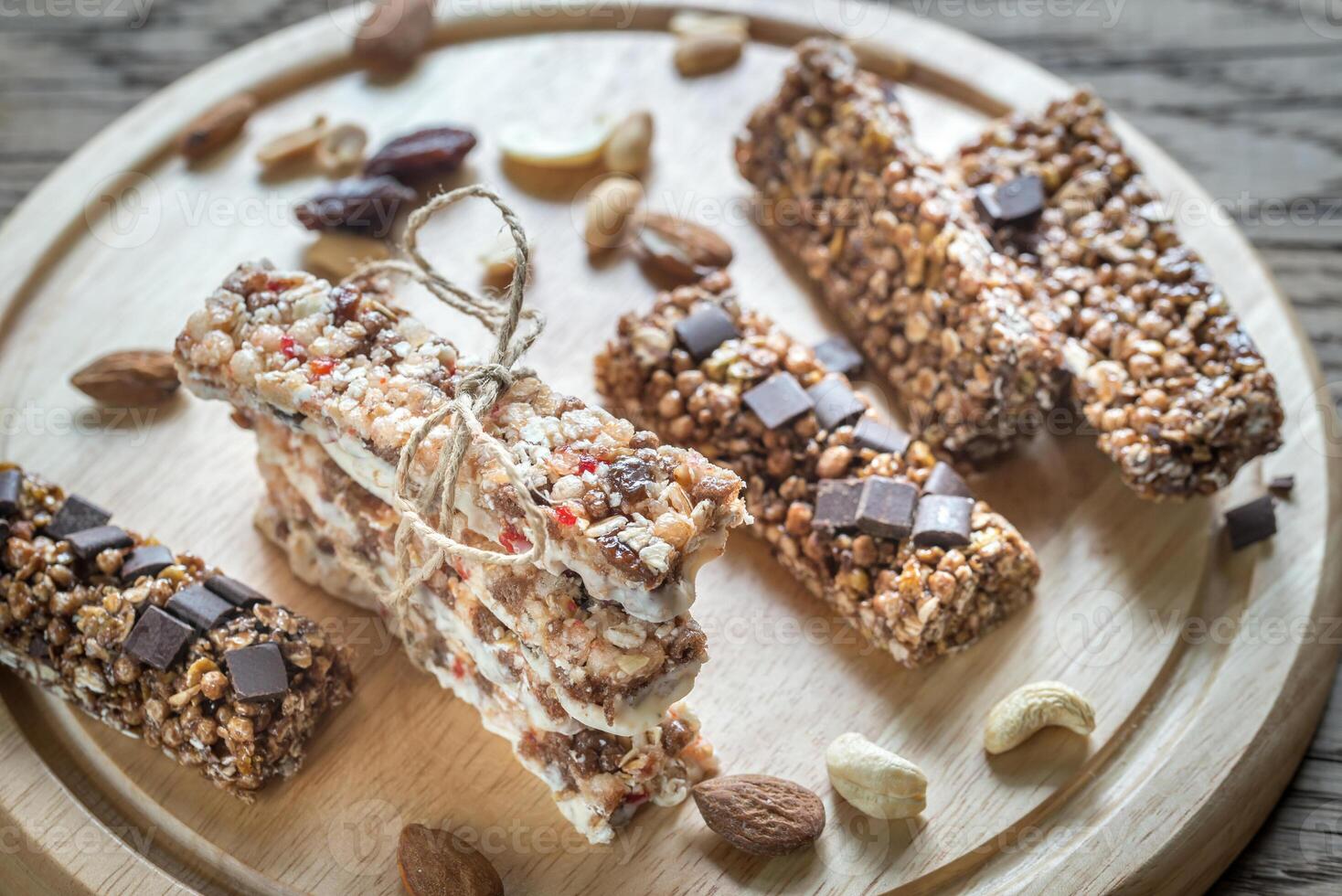 Granola bars with dried berries and chocolate photo