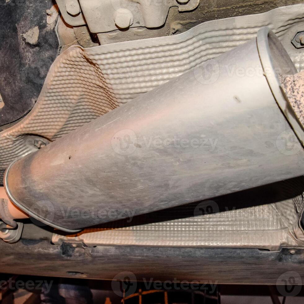 Exhaust system of the car. The muffler of exhaust gases. photo