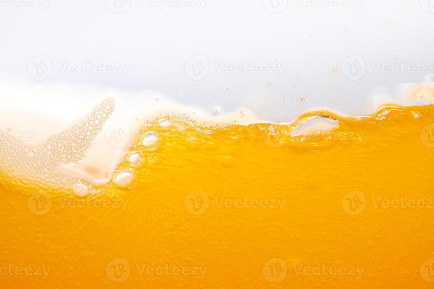 Close up bright orange juice splash texture for health and nature waves, Beautiful waves curve and little bubbles smooth for garphic design and background photo