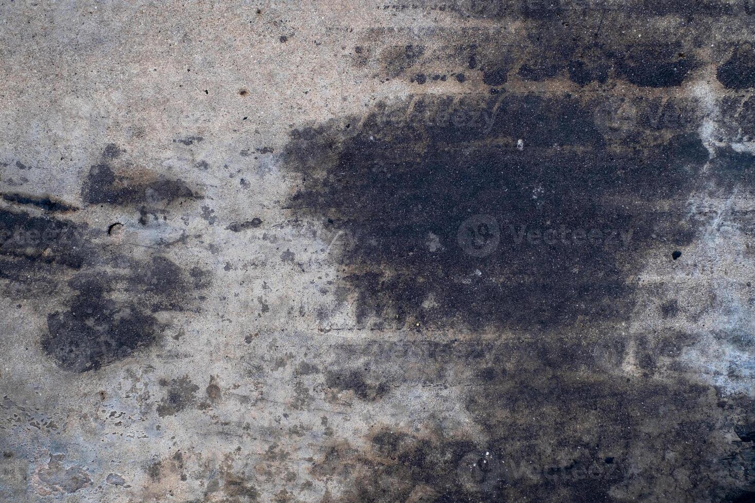 Car oil stains dripping onto cement floor, car engine oil, cement floor, dirt, old, top view, photo