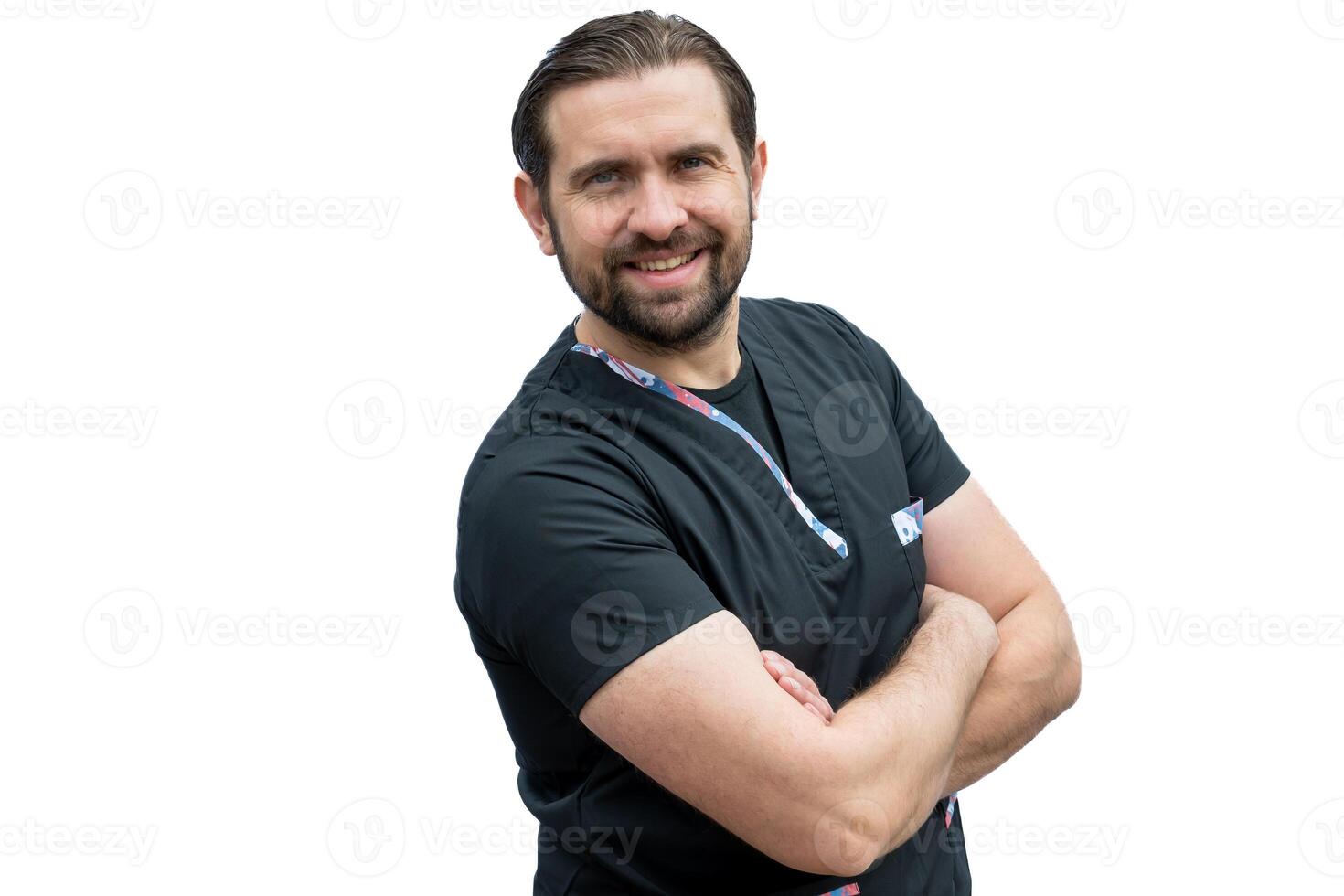 Caucasian latin doctor crossing his arms smiling looking at the camera. photo