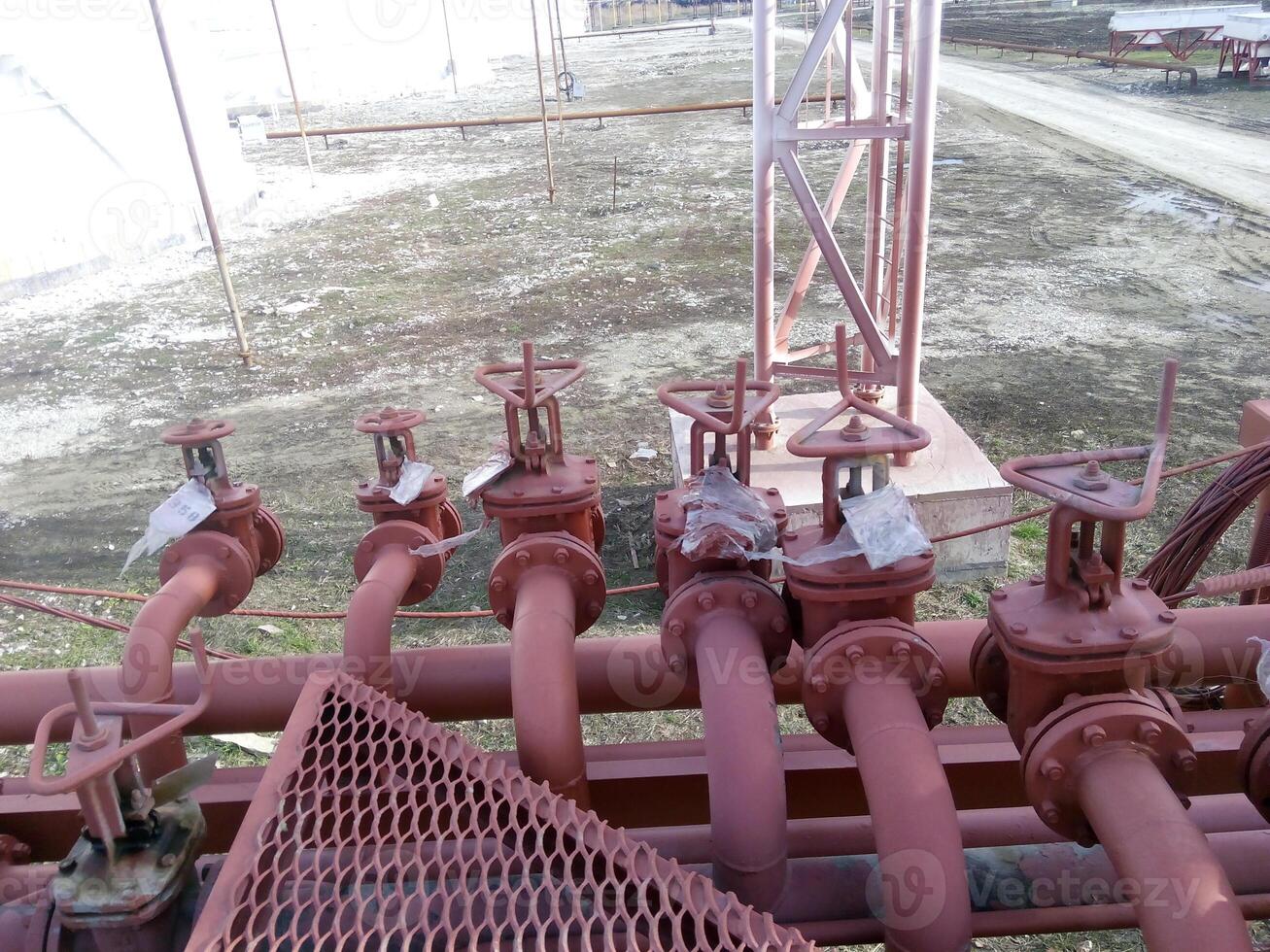 Valves on the pipeline for pumping oil photo