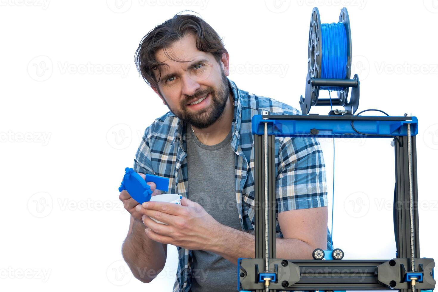 Man doing 3D printing work. Toung entrepreneur 3d. photo