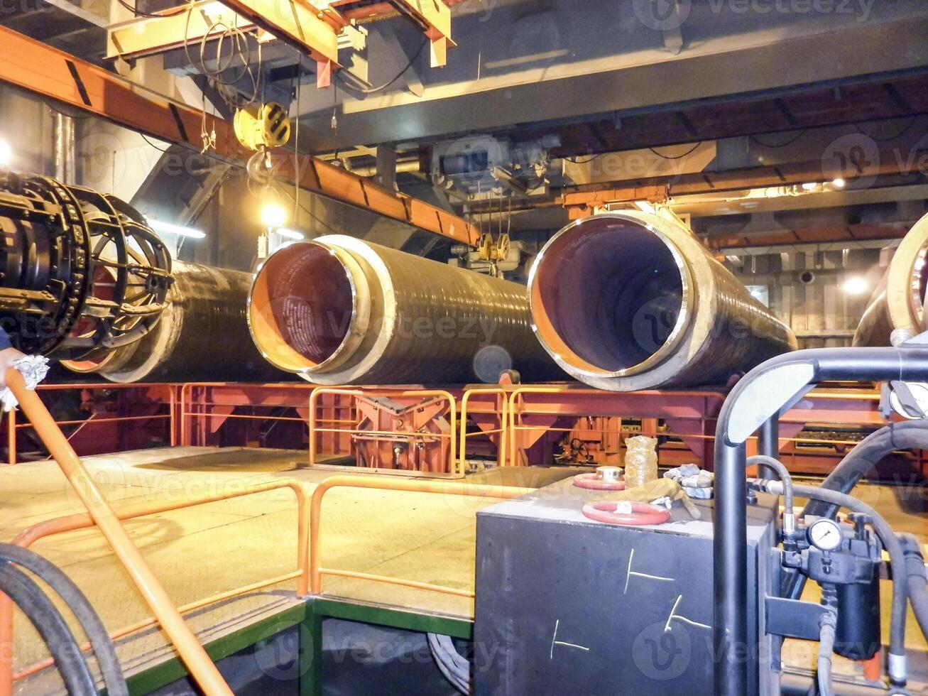 Safety at work. Welding and installation of the pipeline. Industrial weekdays welders and fitters photo