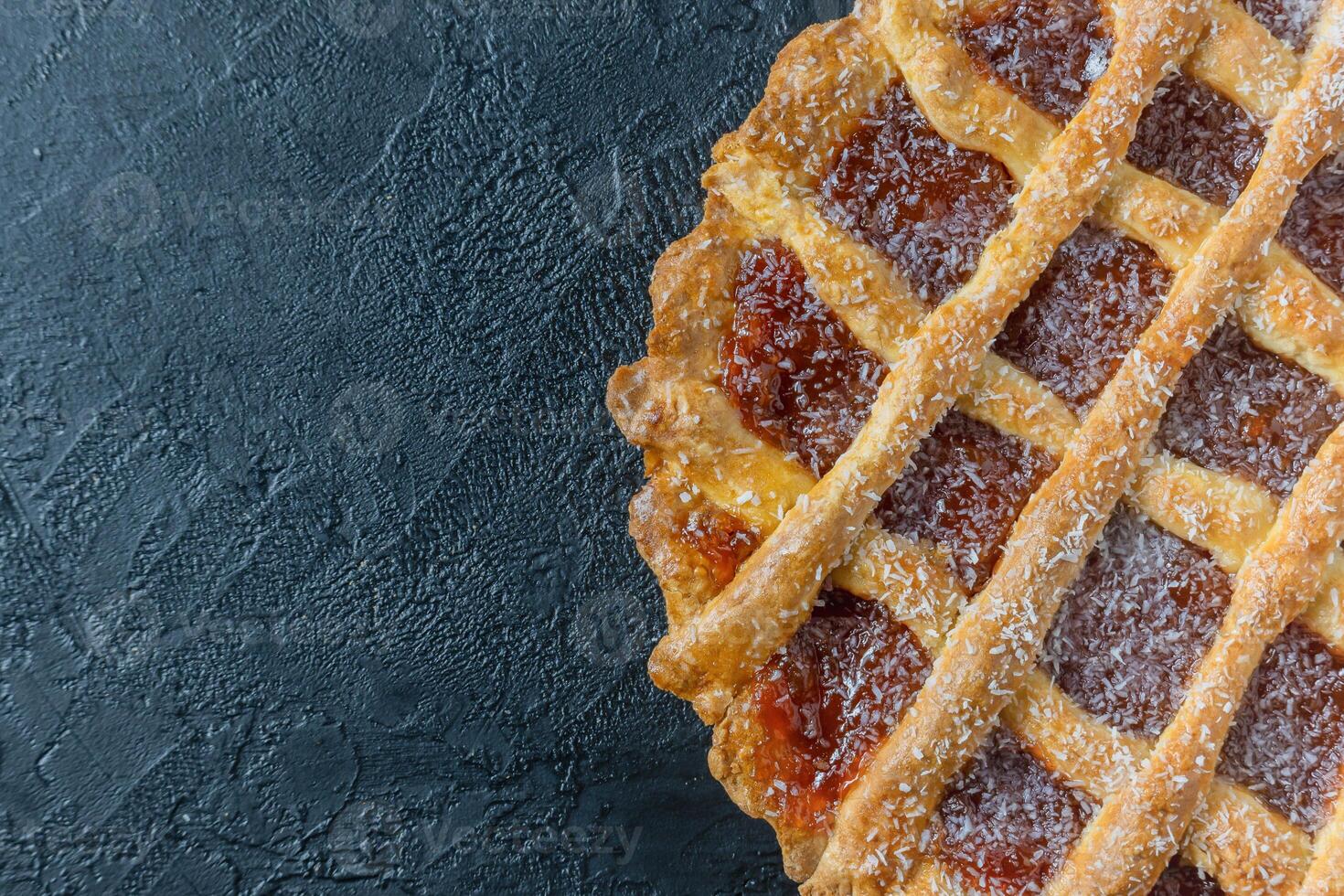 Close-up of pastafrola on a black counter. photo