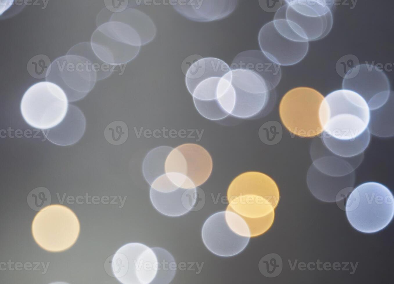 Silver abstract background with shiny silver floating bokeh. photo