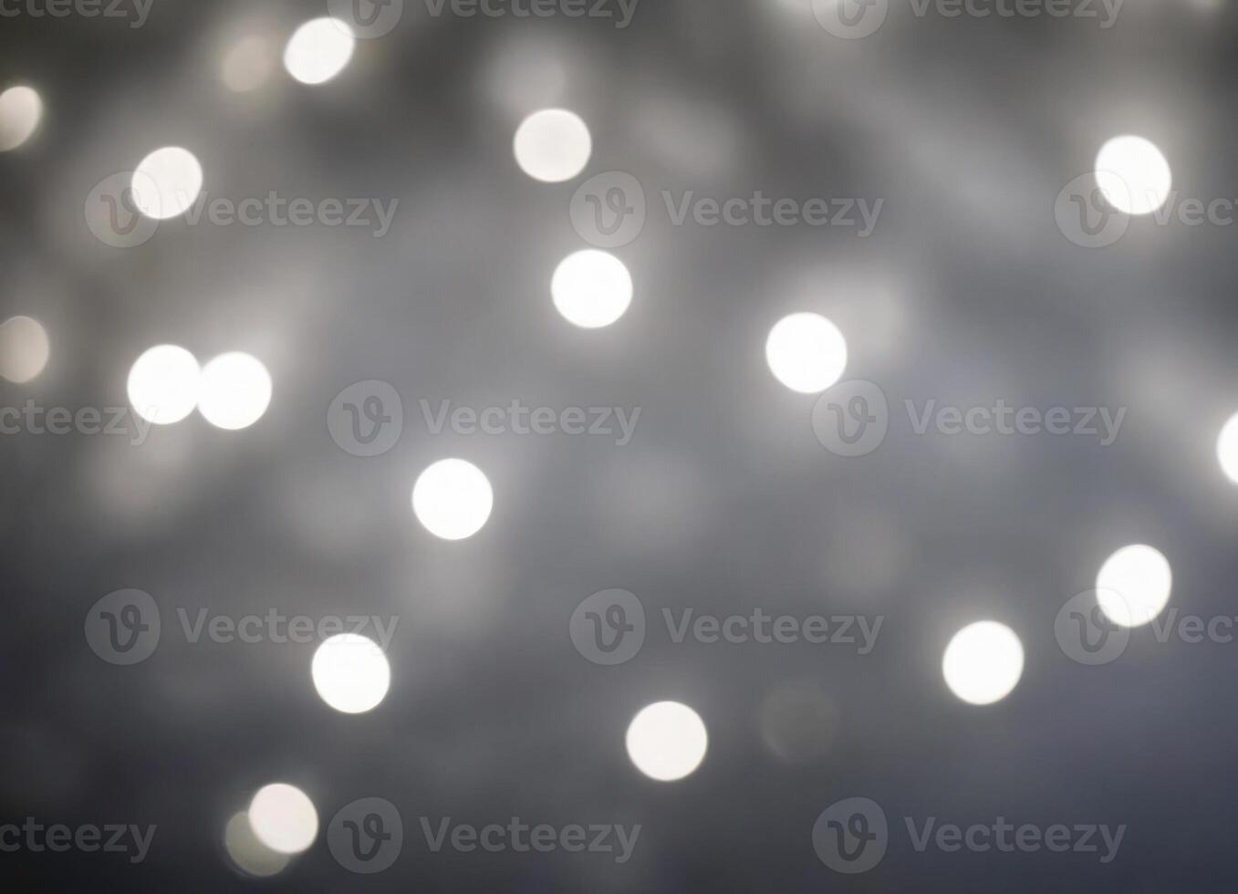 Silver abstract background with shiny silver floating bokeh. photo