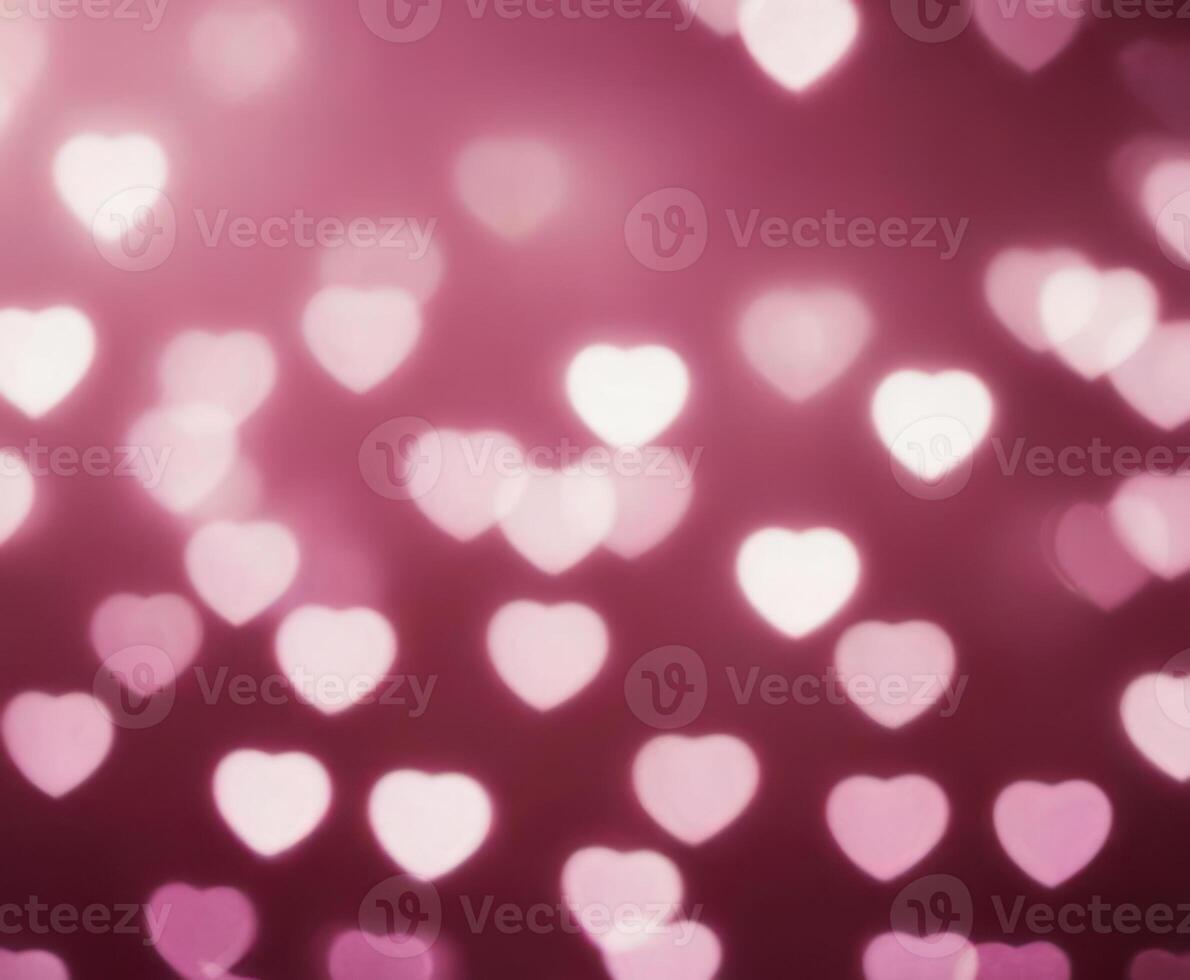 Pink blurred abstract background with cute bokeh hearts for mothers day. photo