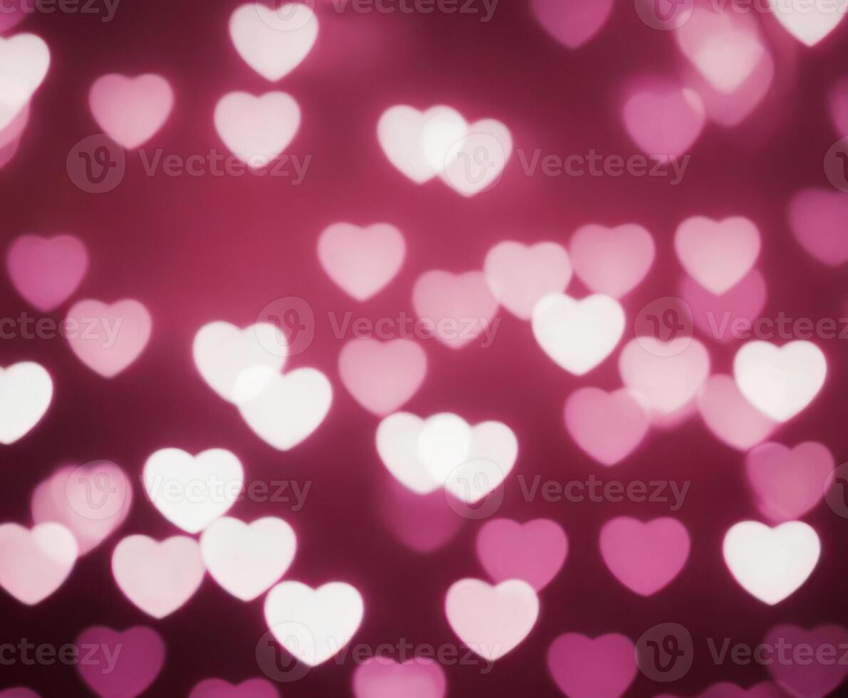 Pink blurred abstract background with cute bokeh hearts for mothers day. photo