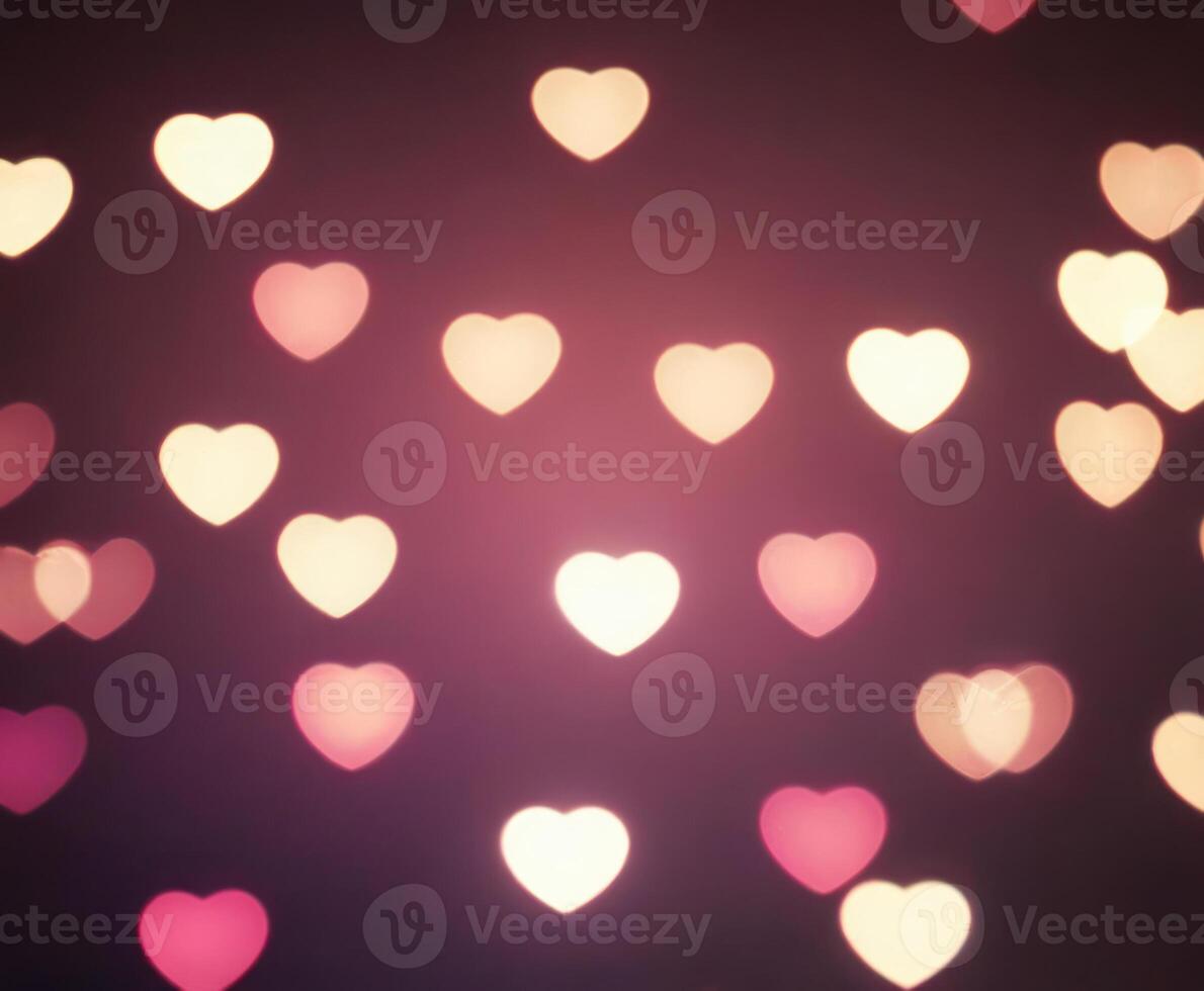 Pink blurred abstract background with cute bokeh hearts. photo