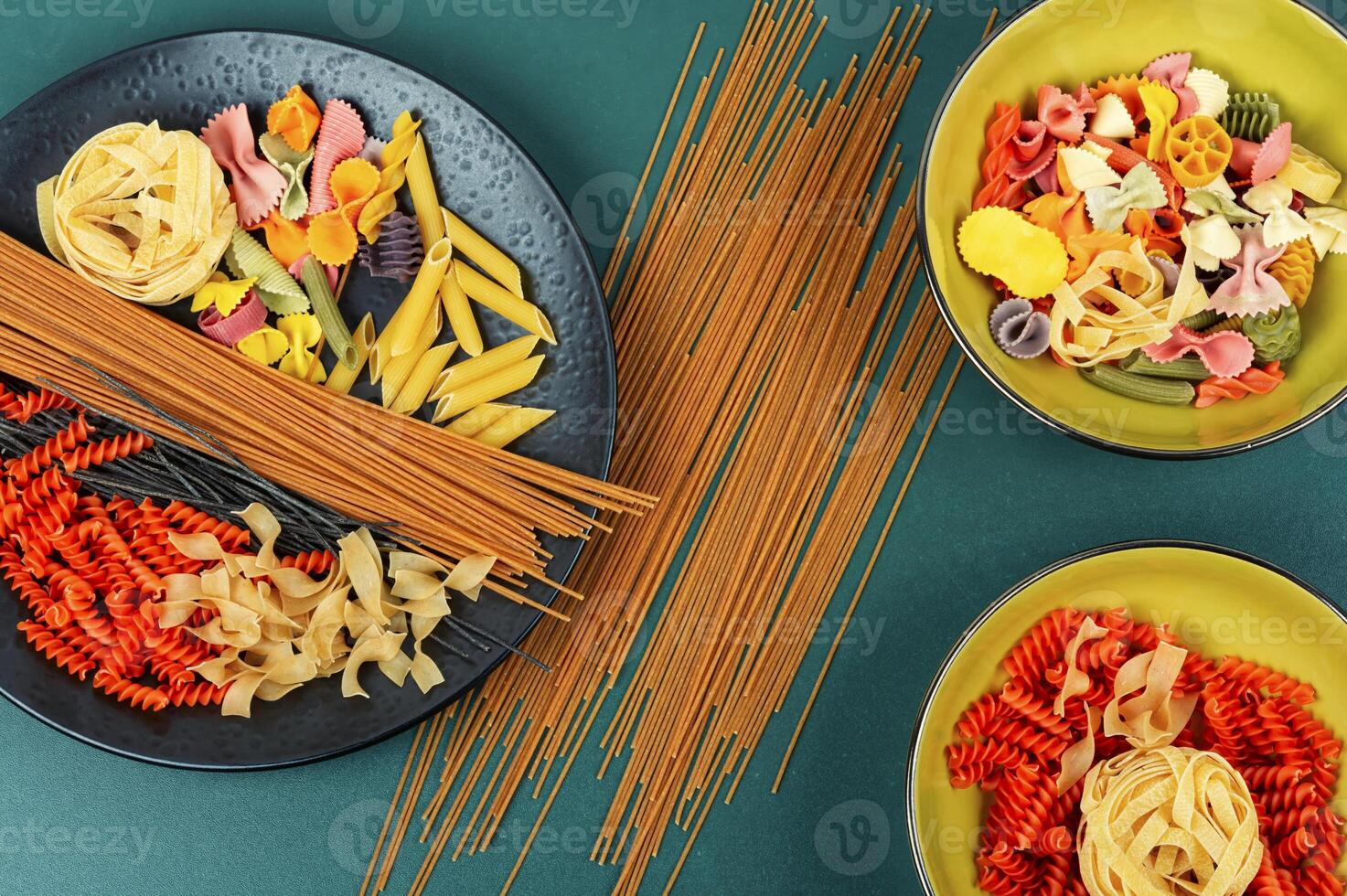 Assortment of raw pasta and macaroni. photo