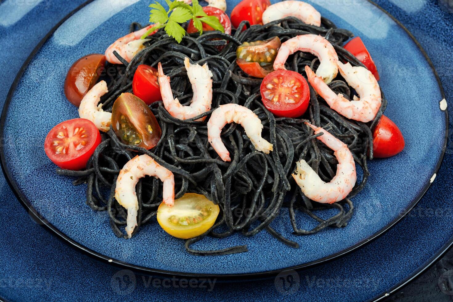Vegan spaghetti with seafood. photo