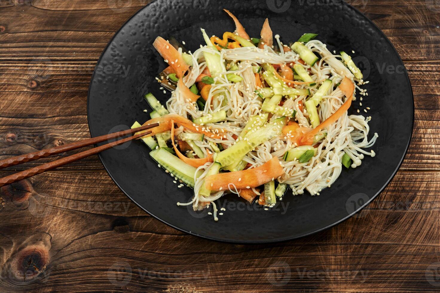 Chinese salad with enoki mushrooms. photo