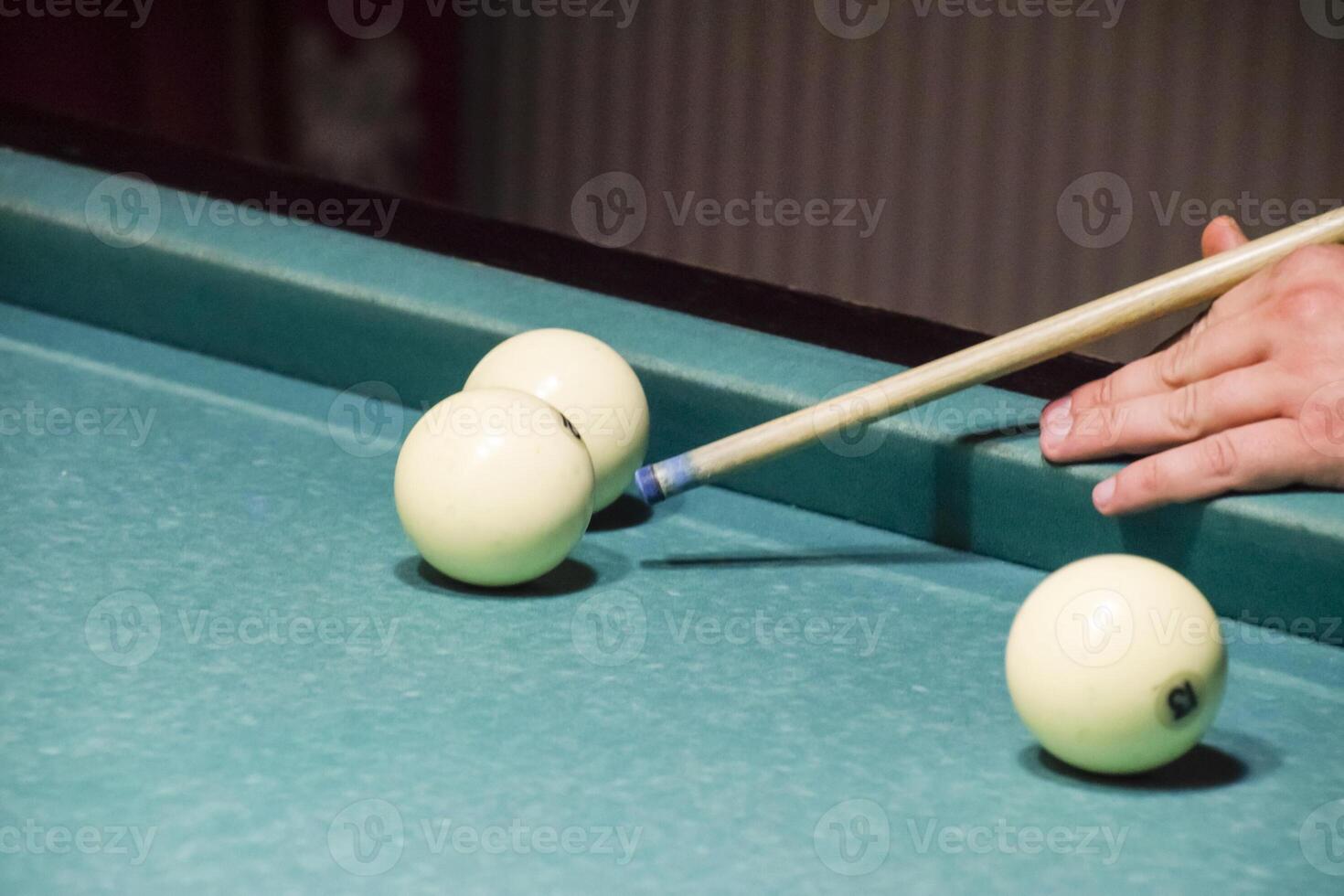 Billiards, billiard table. Targeting the cue in the ball for imp photo