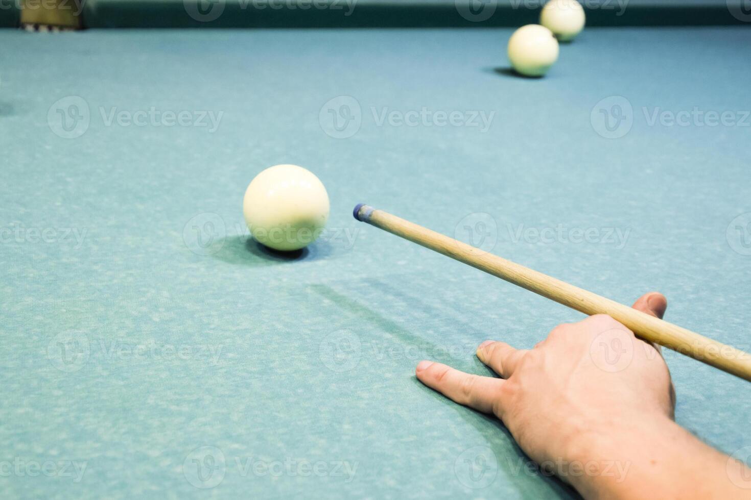 Billiards, billiard table. Targeting the cue in the ball for imp photo