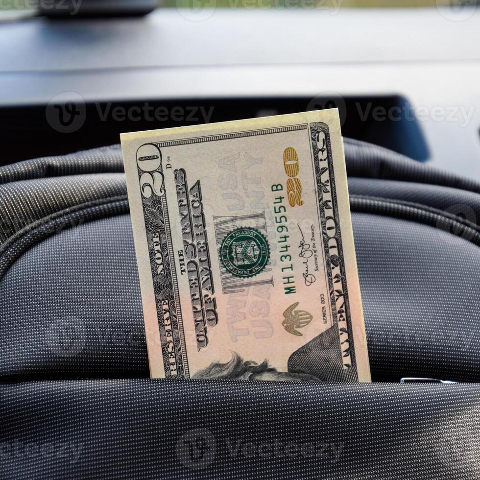 Dollars in the pocket of the bag. American Money photo