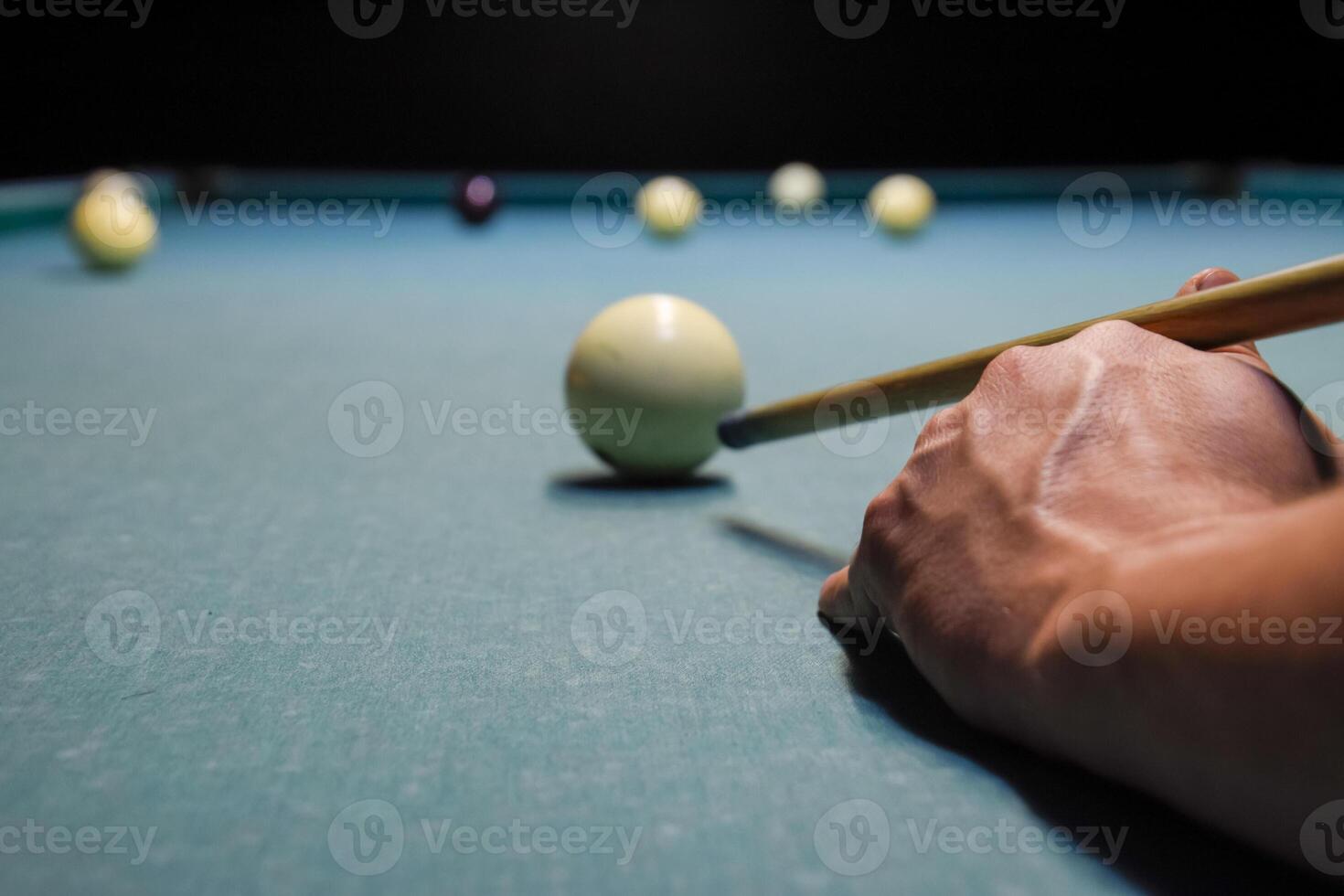 Billiards, billiard table. Targeting the cue in the ball for imp photo