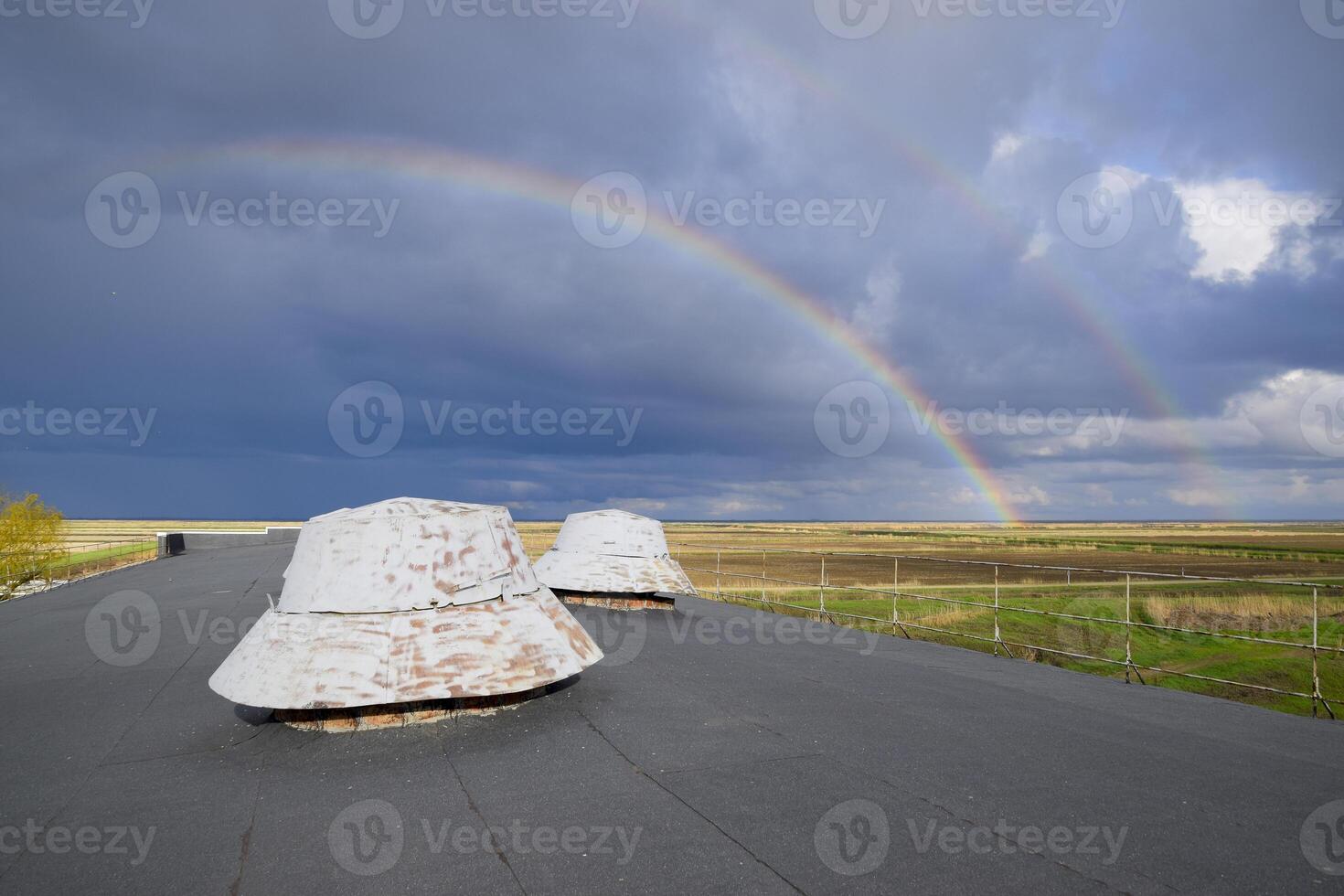 Rainbow, view from the roof of the building. Ventilation outlets photo