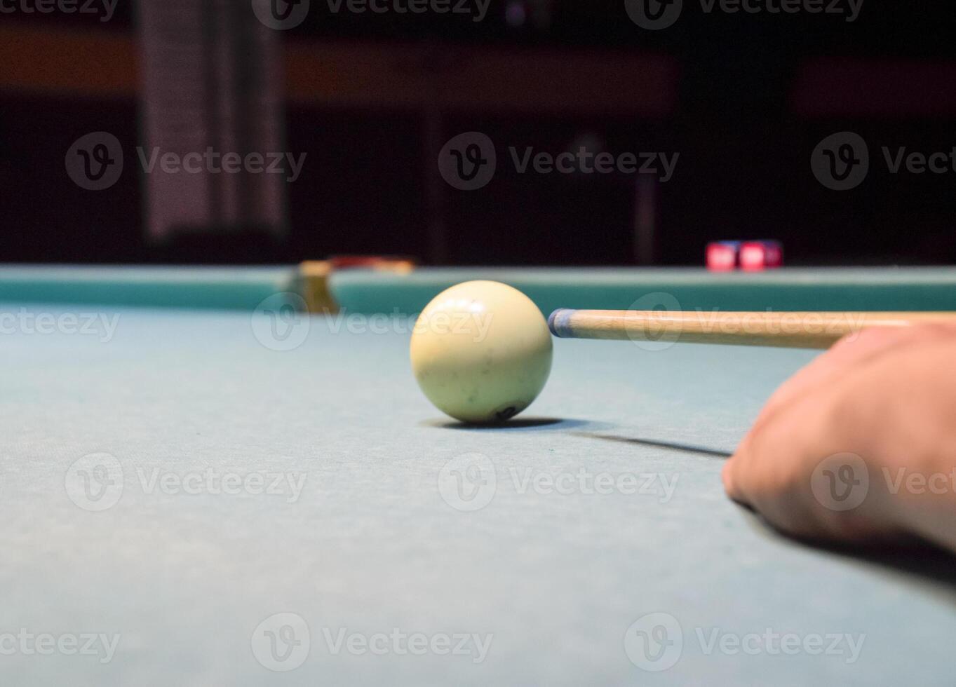 Billiards, billiard table. Targeting the cue in the ball for imp photo