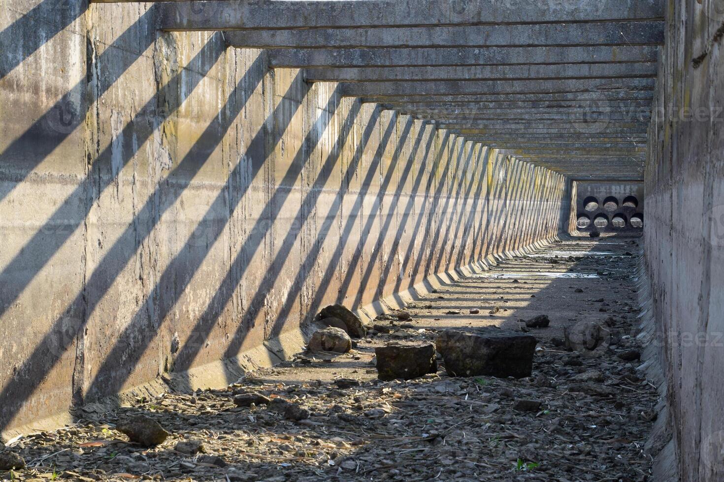 inside view of the irrigation artificial concrete channel. photo