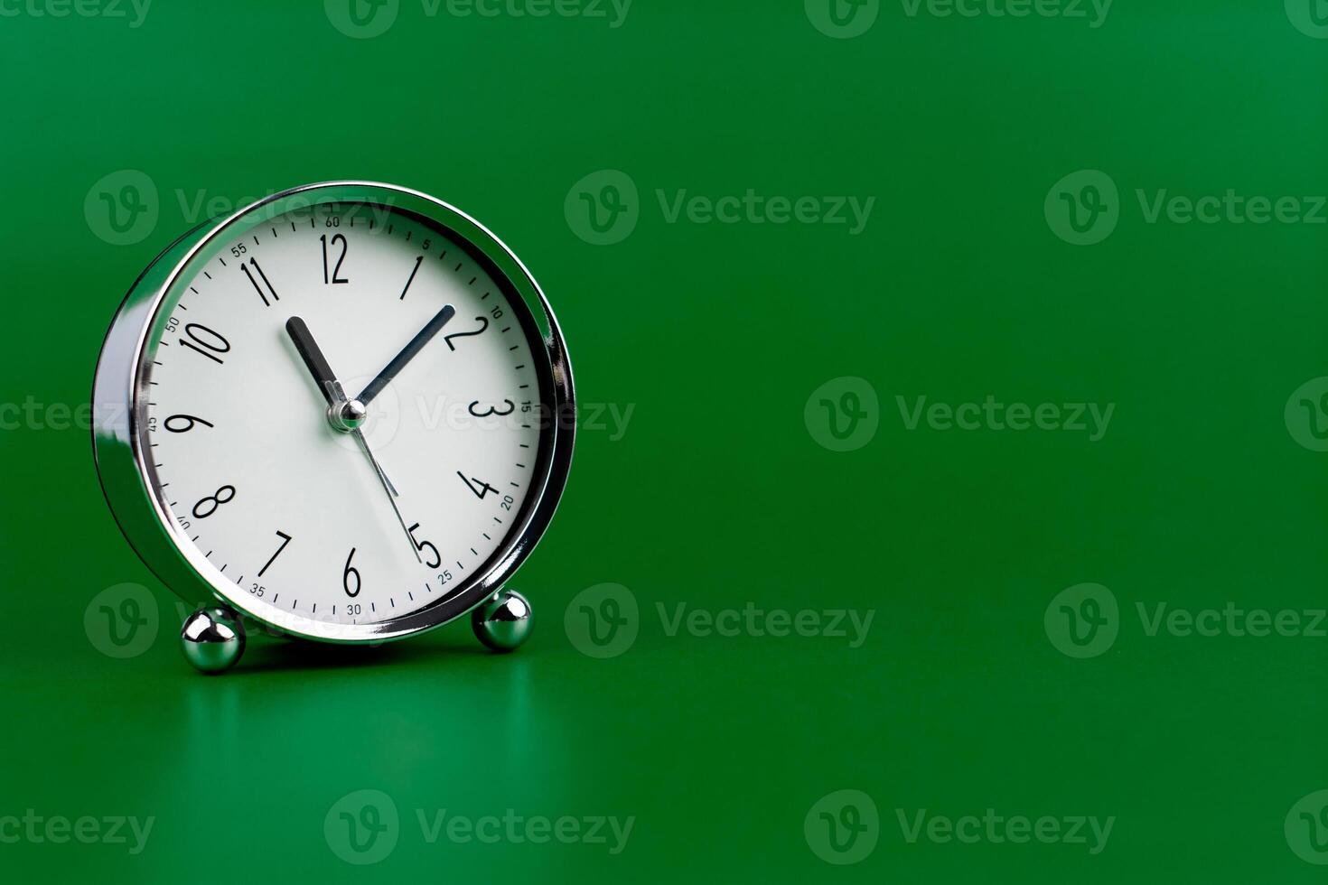 Time and work in daily life Photo of a modern clock in a high quality photo studio.