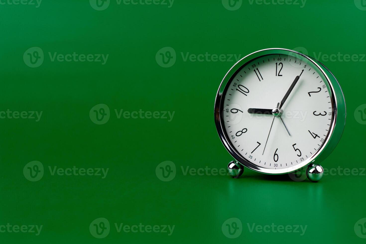 Time and work in daily life Photo of a modern clock in a high quality photo studio.