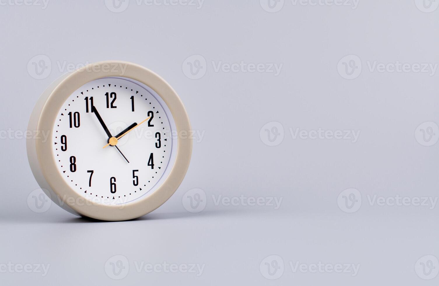Time and work in daily life Photo of a modern clock in a high quality photo studio.