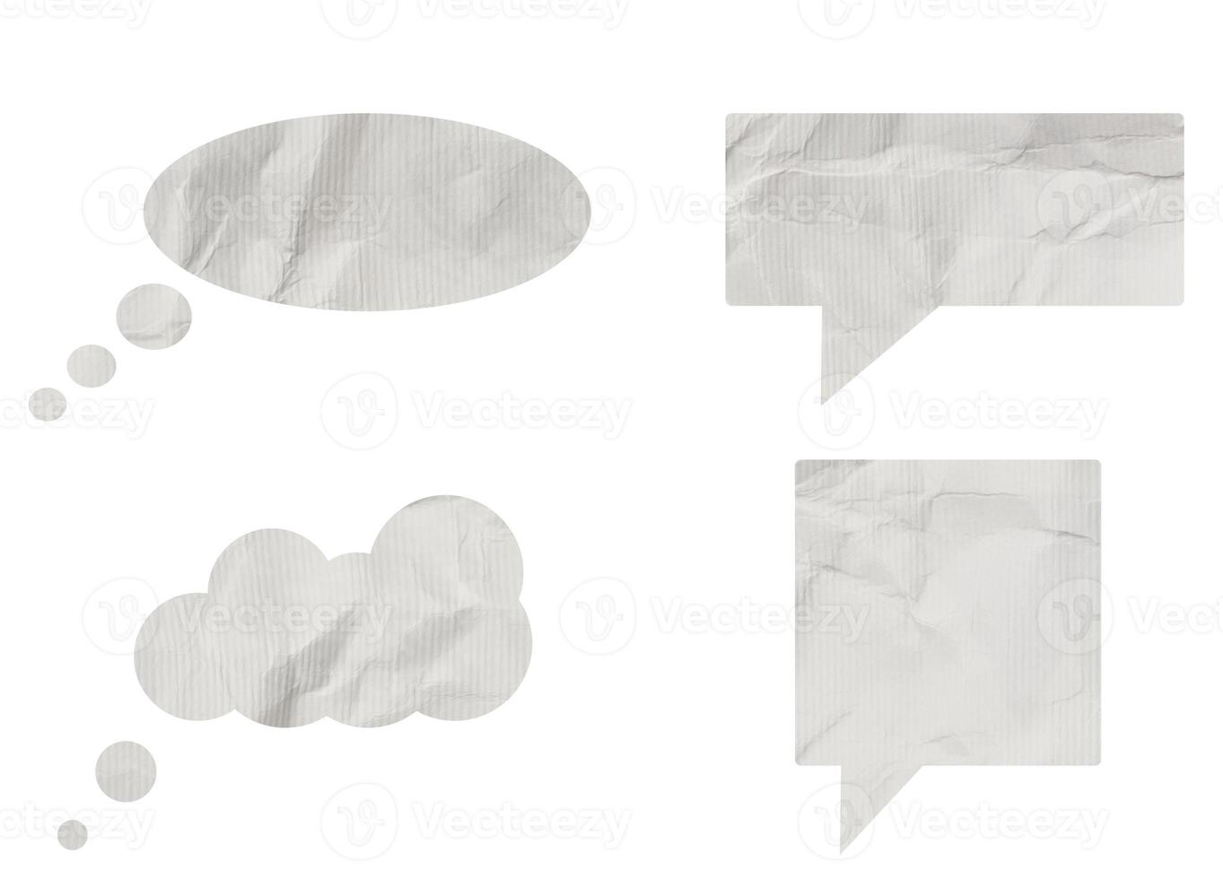 Conversation clouds cut made of white crumpled paper on isolated background photo