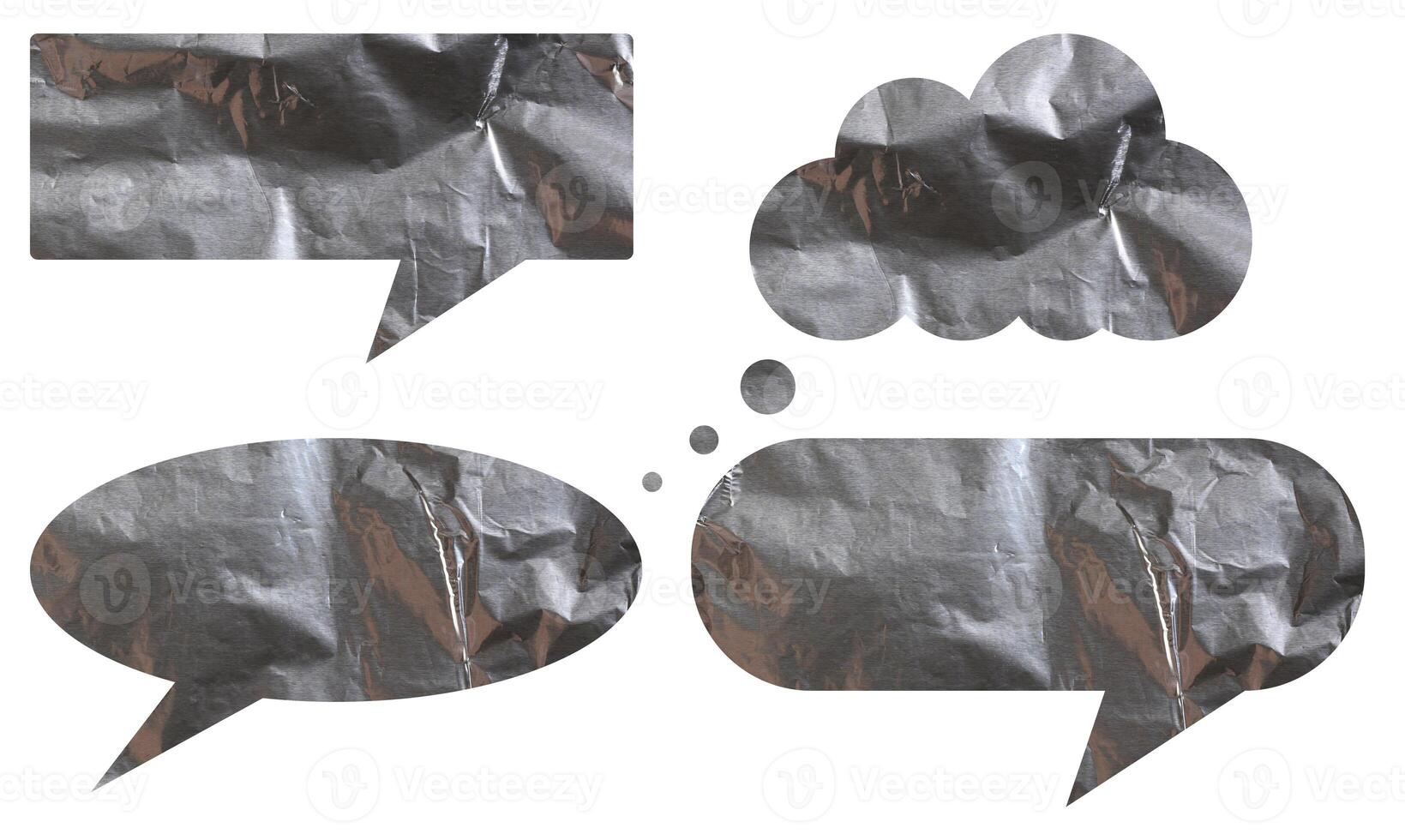 Conversation clouds cut from foil on isolated background photo