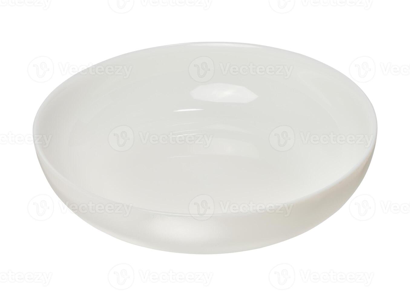 Empty white round ceramic plate on isolated background photo