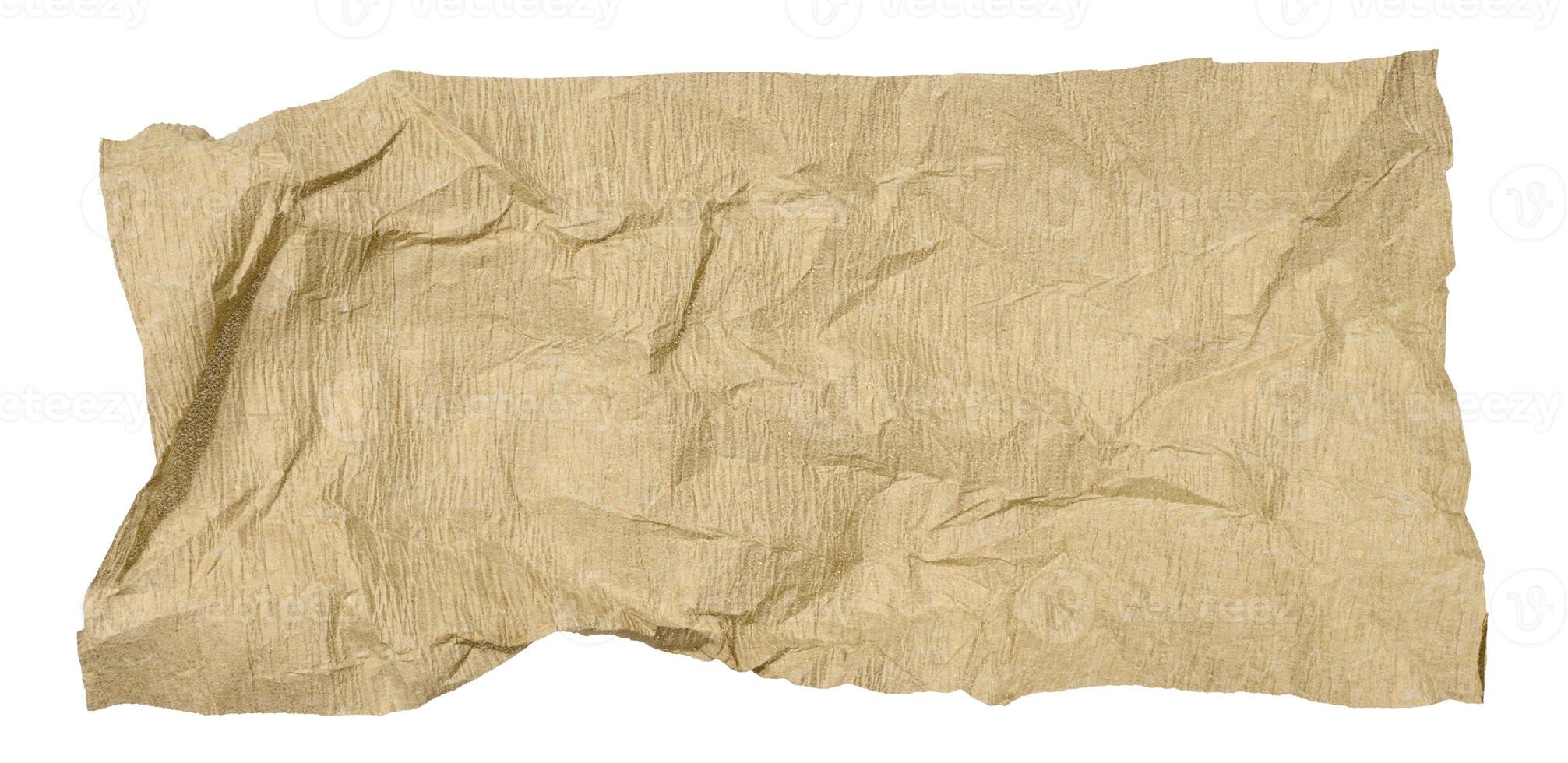 Crumpled piece of brown paper on isolated background photo
