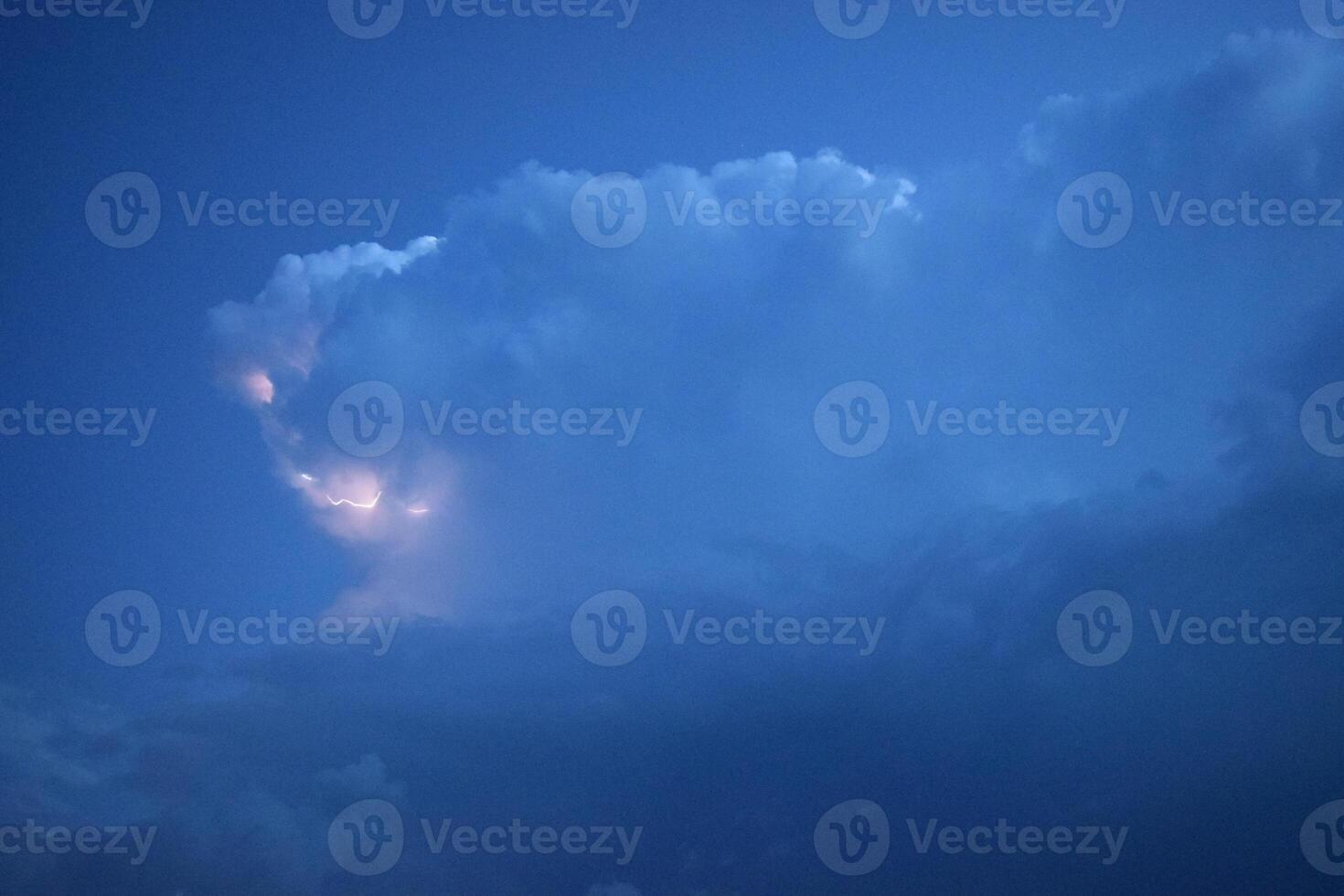 Lightnings in storm clouds photo