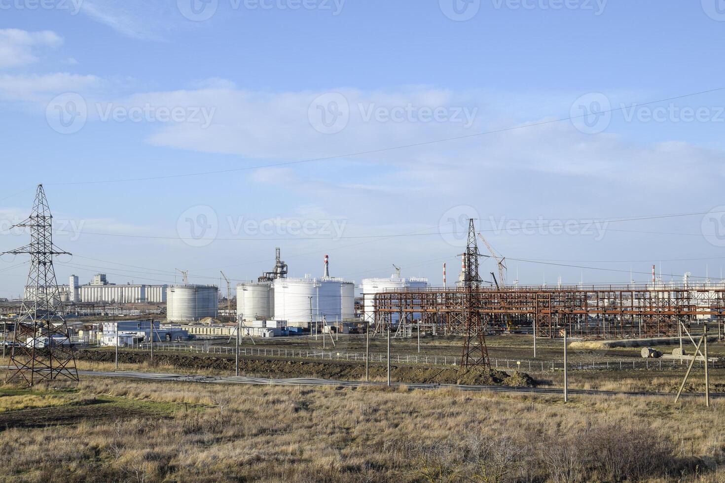 Distillation columns, pipes and other equipment furnaces refinery. photo