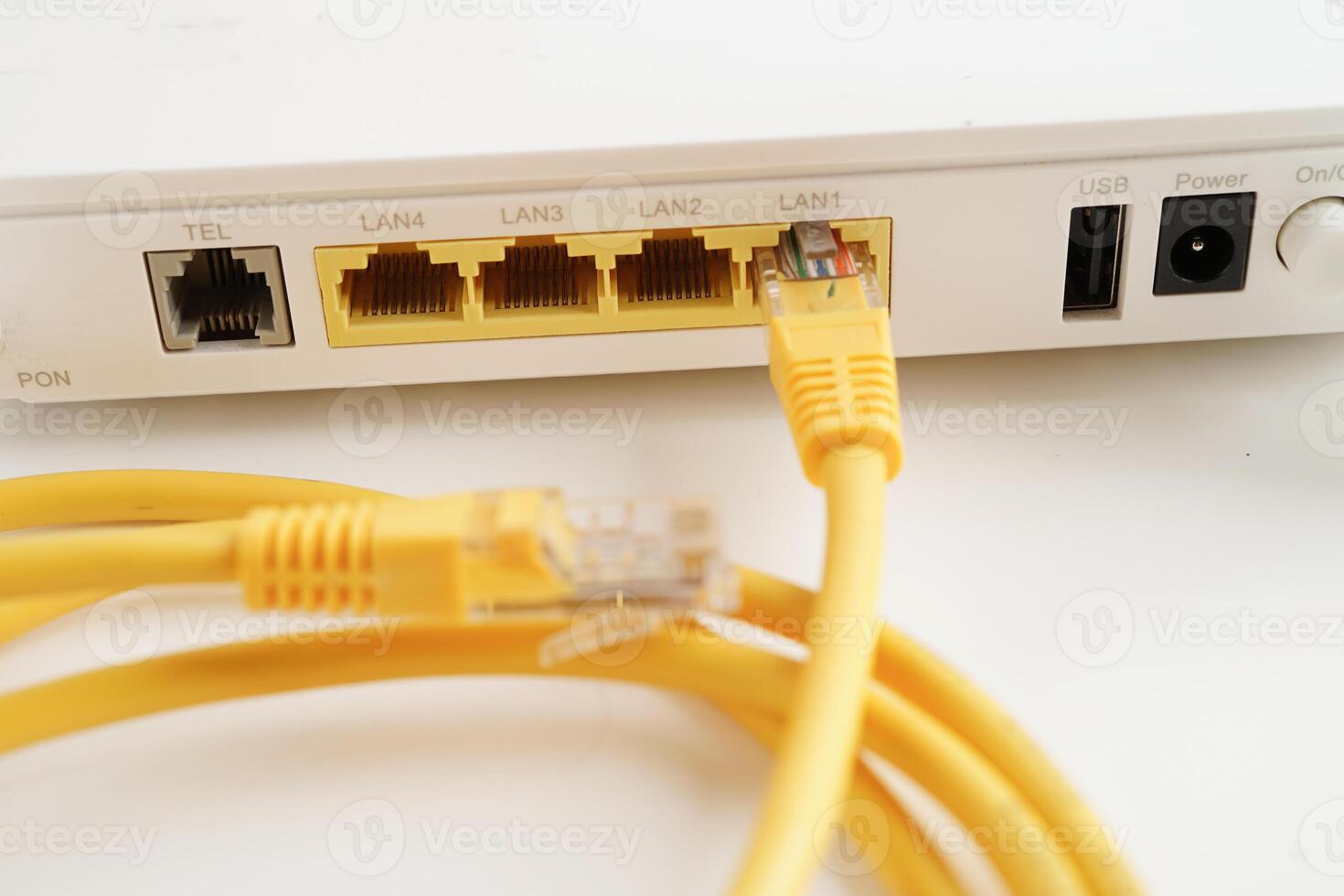 Ethernet cable with wireless router connect to internet service provider network. photo