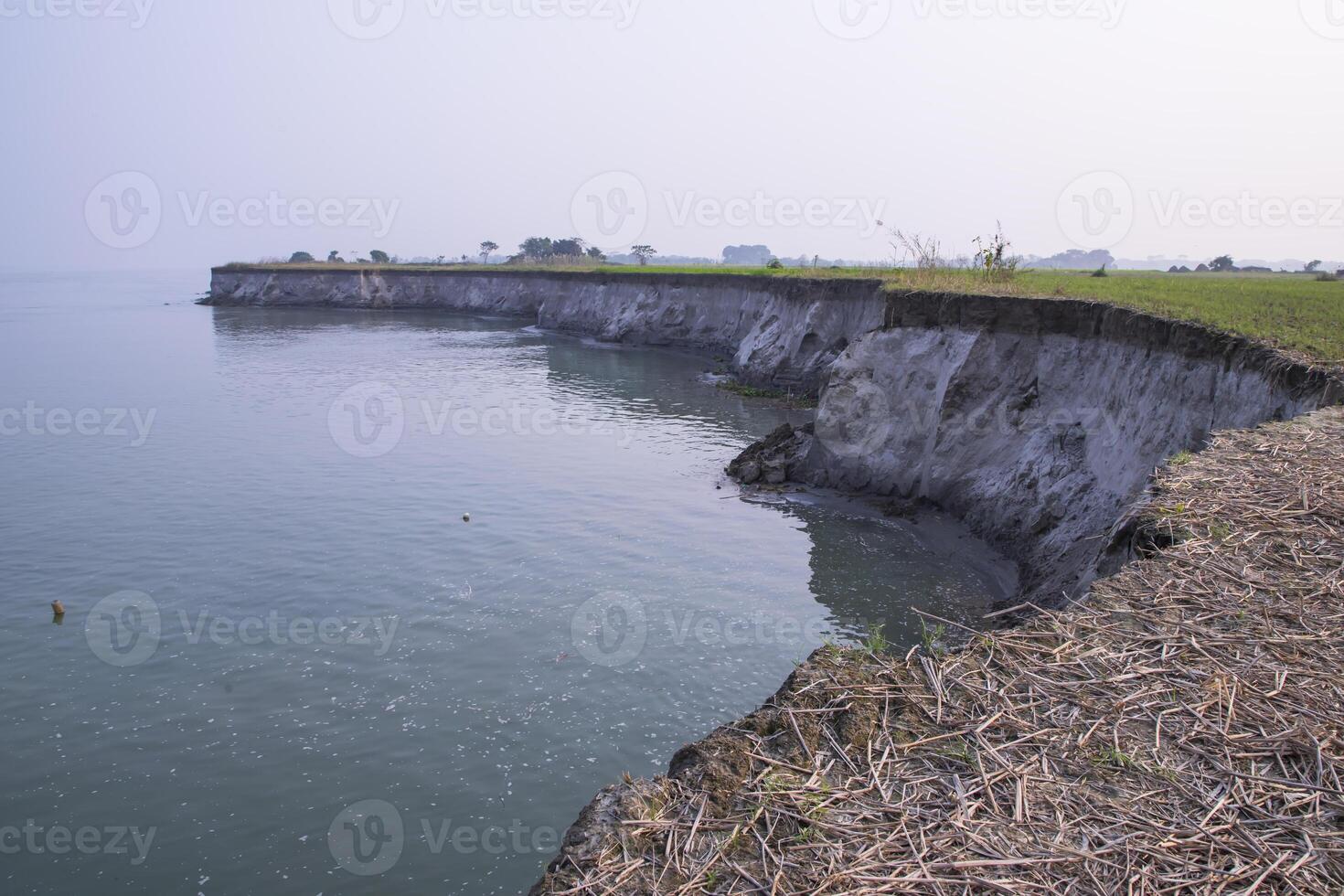 Natural Landscape view of the Bank of the Padma River with The Blue water photo