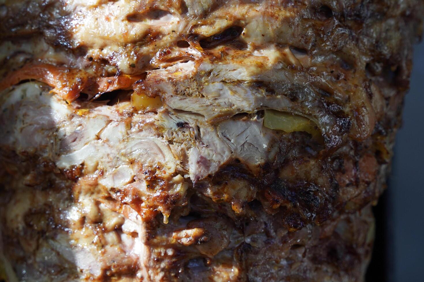 Turkish dish Doner Kebab as a turning roast photo