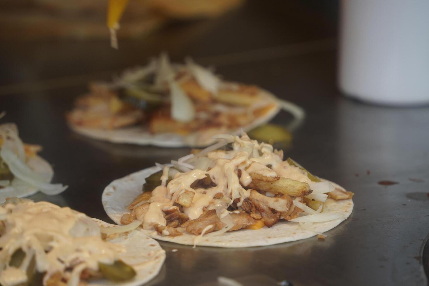 Turkish dish Doner Kebab as a turning roast photo