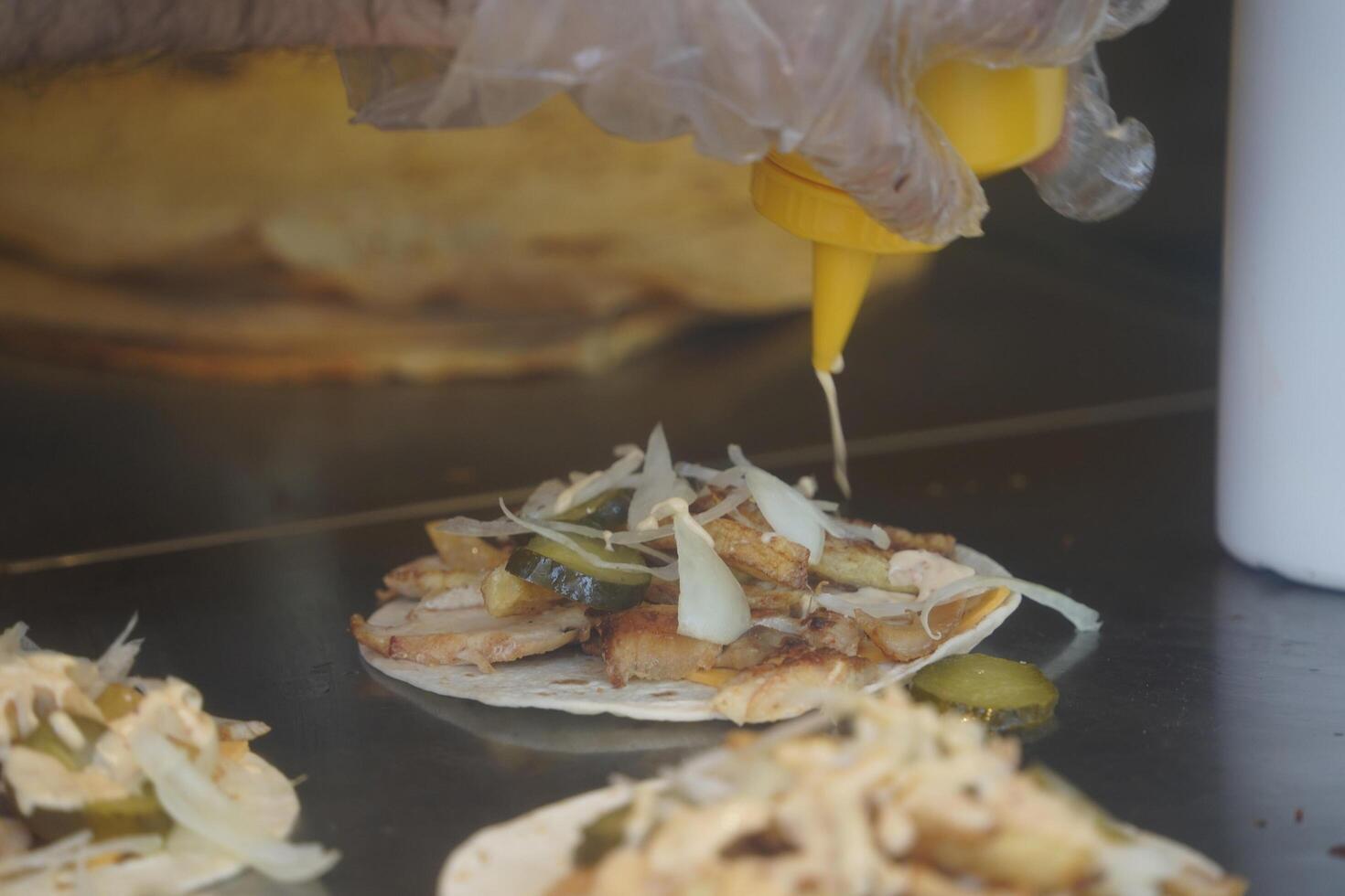 Turkish dish Doner Kebab as a turning roast photo