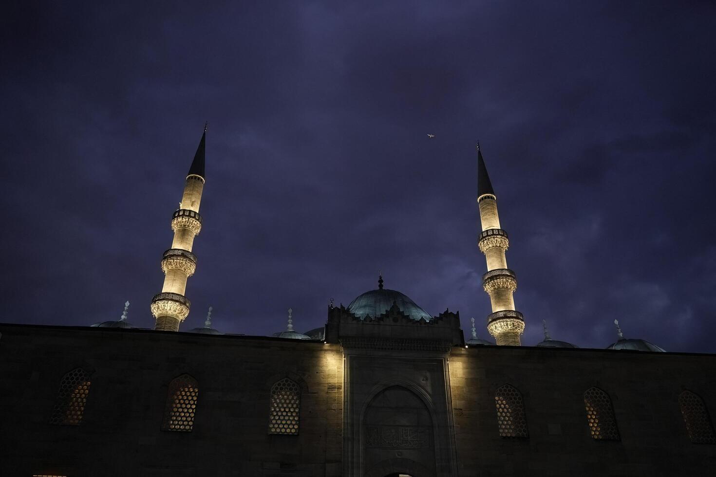 Eminonu yeni cami new mosque in istanbul turkey night view photo