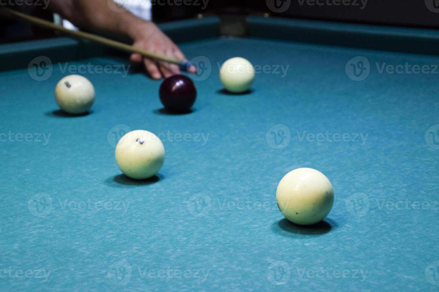 Billiards, billiard table. Targeting the cue in the ball for imp photo