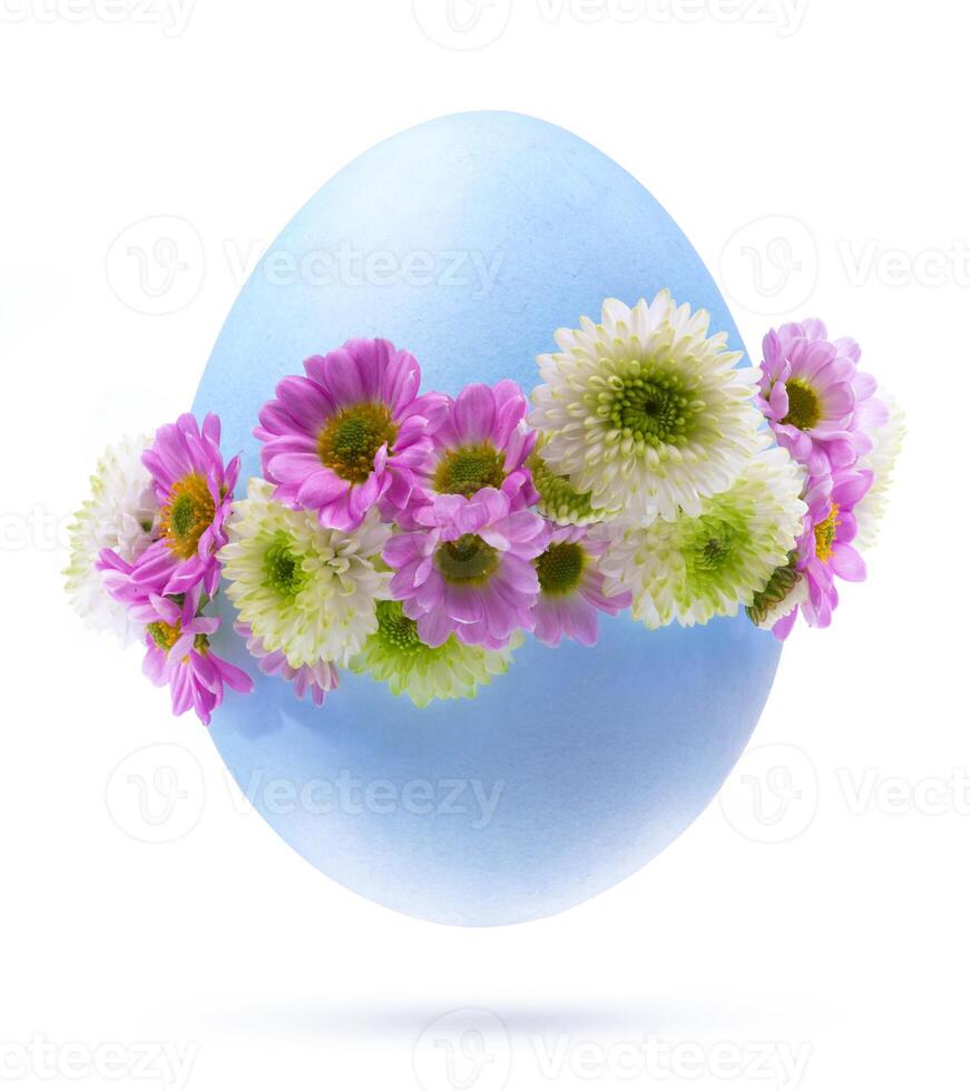 Art Easter egg decorated by flowers Isolated on white background photo