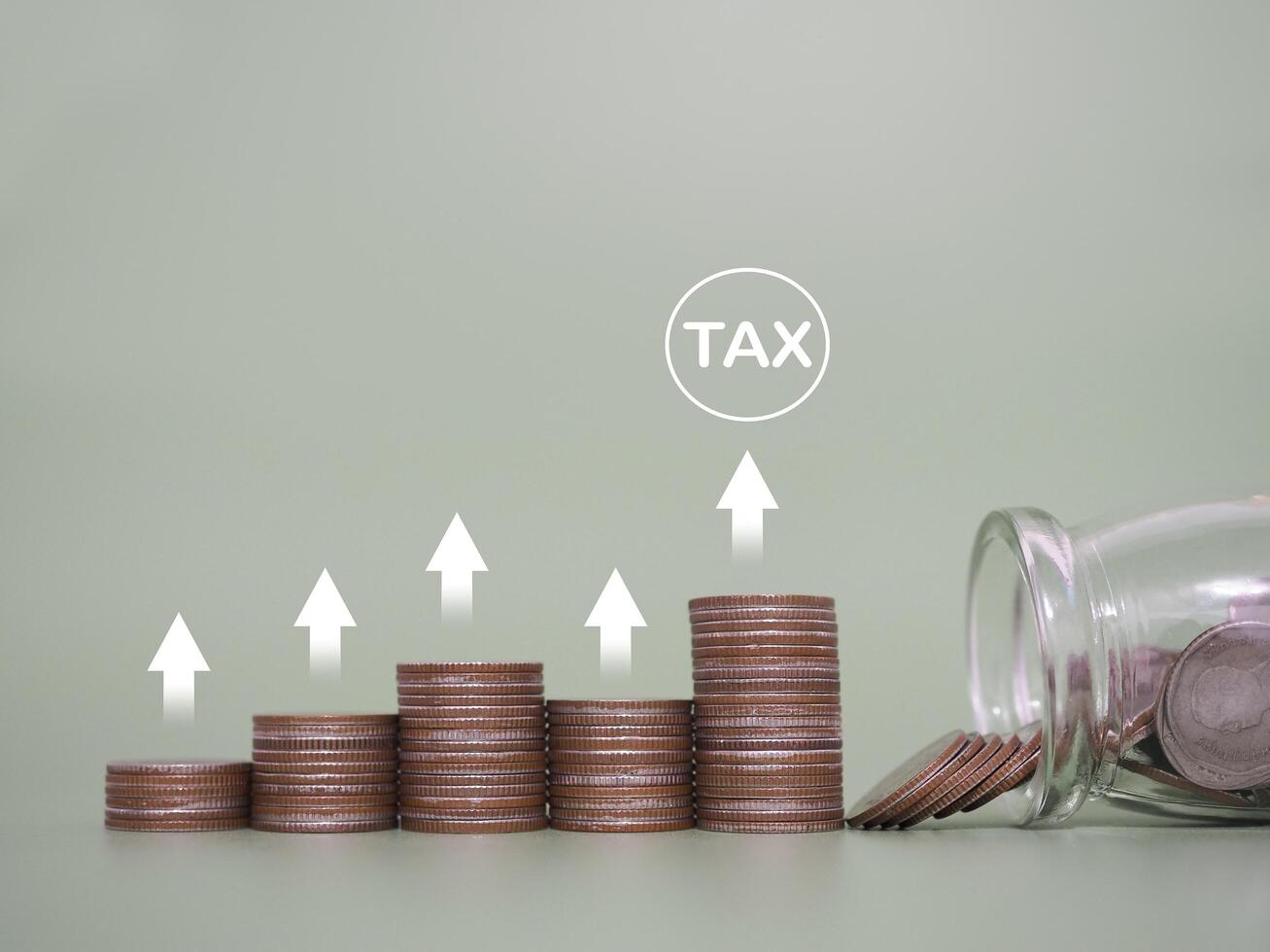 Stack of coins with arrow rising. The concept of business growth, Financial investment, Market stock, Profit return, Dividend,  Business fund and manage to paying tax photo