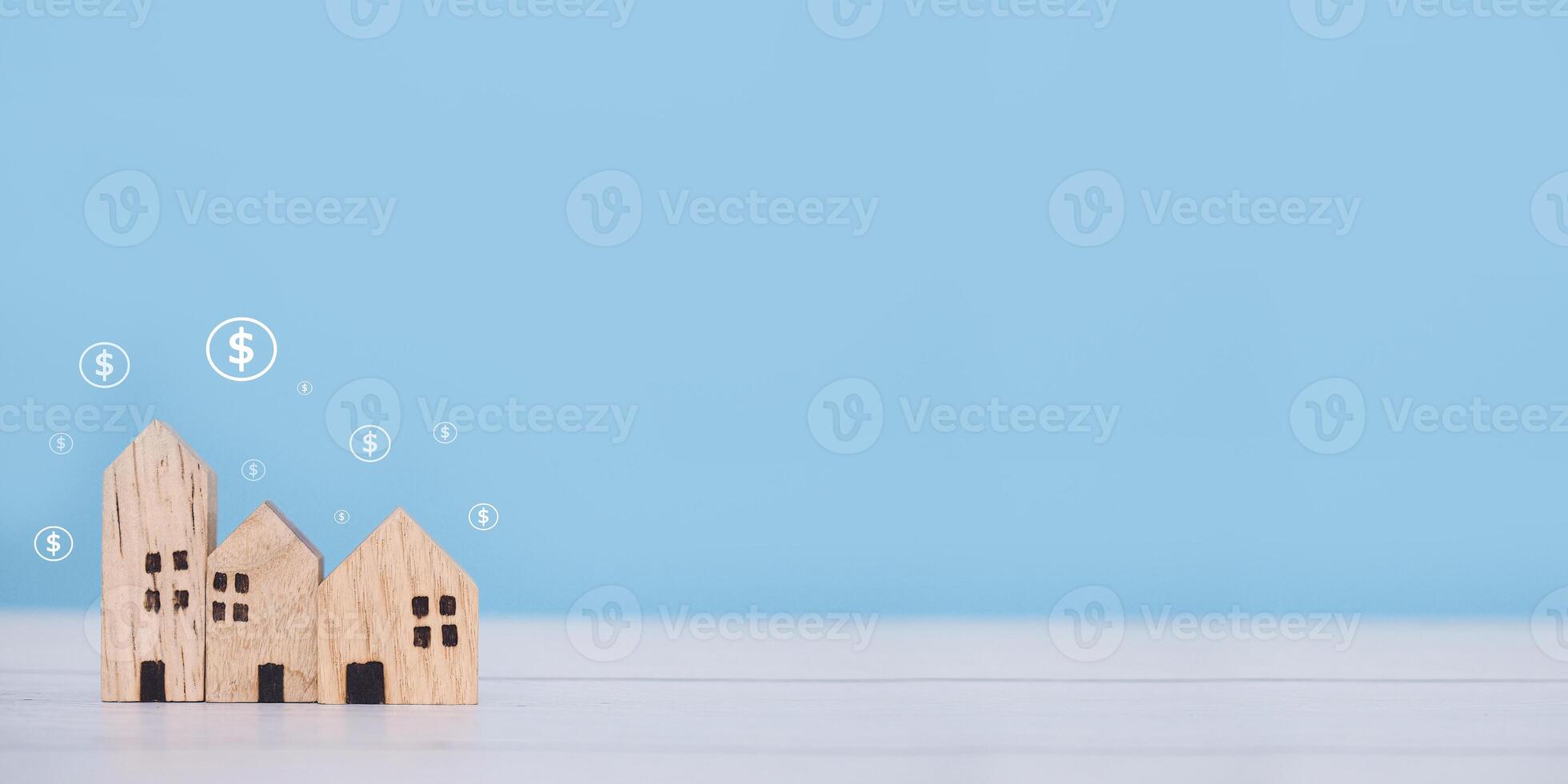 Miniature house and Dollar coin icons. The concept of price of house, Property investment, House mortgage, Real estate photo
