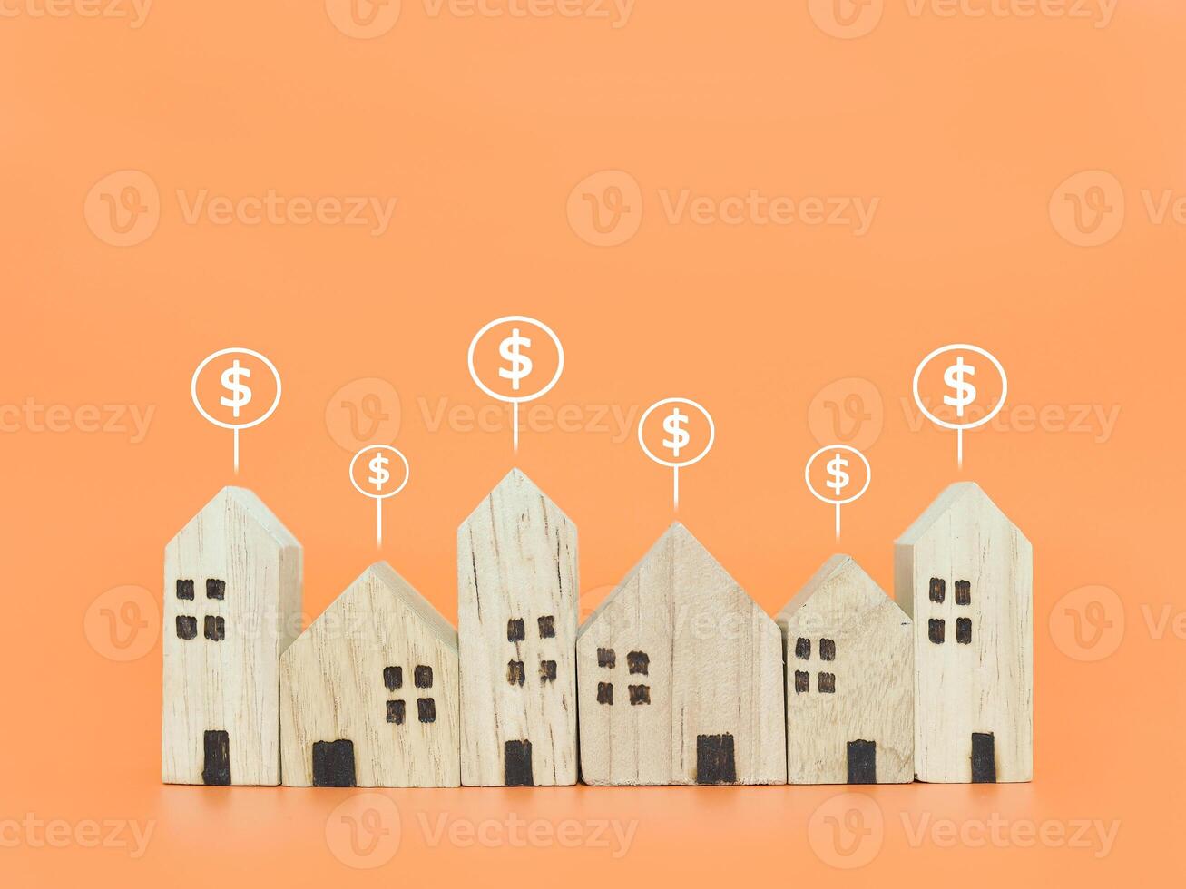 Miniature house and Dollar coin icons. The concept of price of house, Property investment, House mortgage, Real estate photo