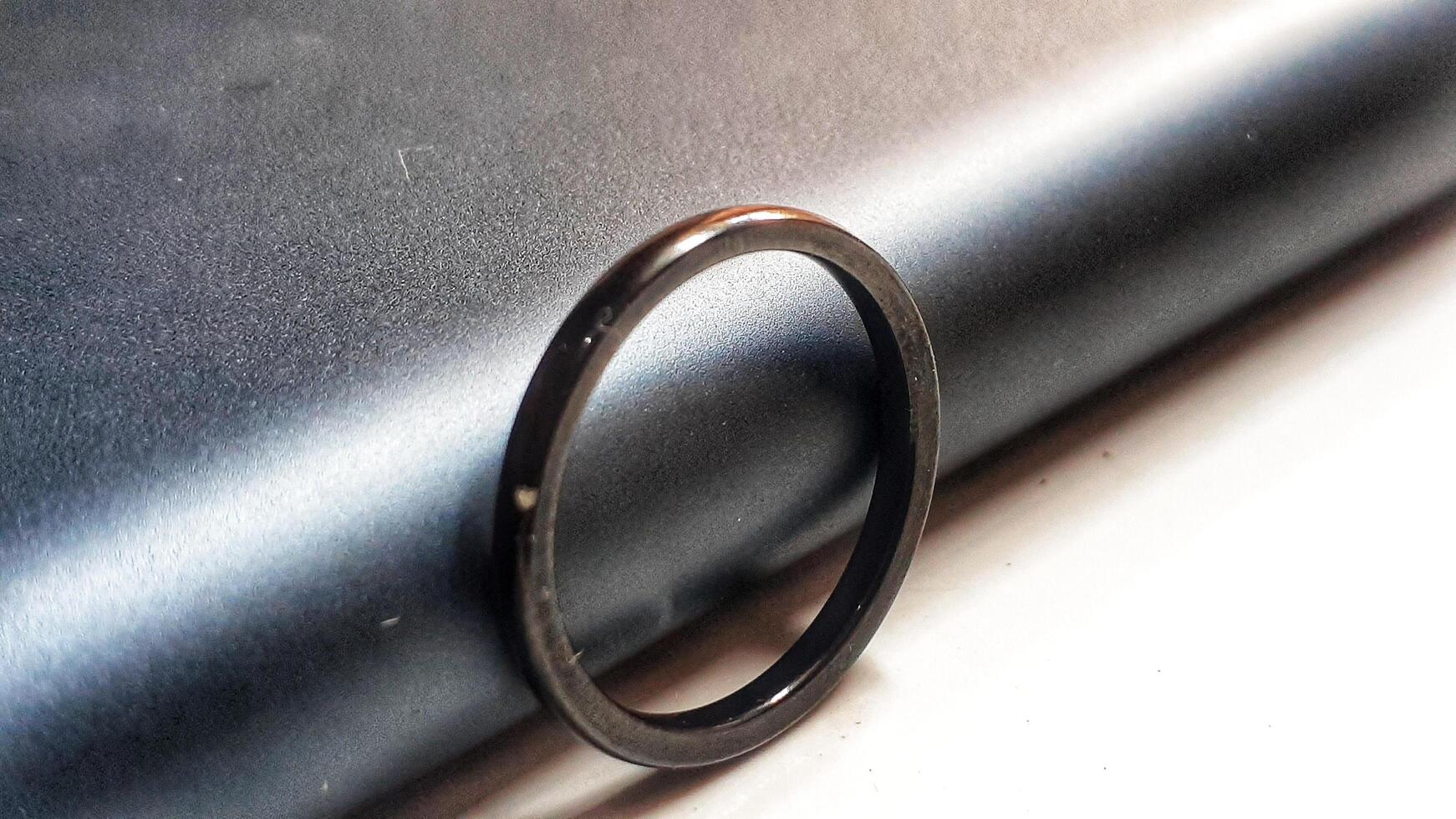 picture of an engagement ring in black photo