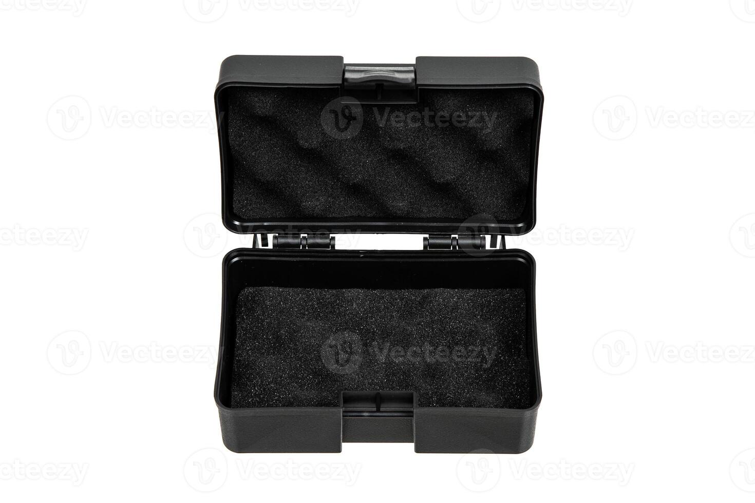 Black plastic container with foam inside for safe storage and transportation of fragile and expensive items. Sturdy plastic case. Isolate on a white back. photo