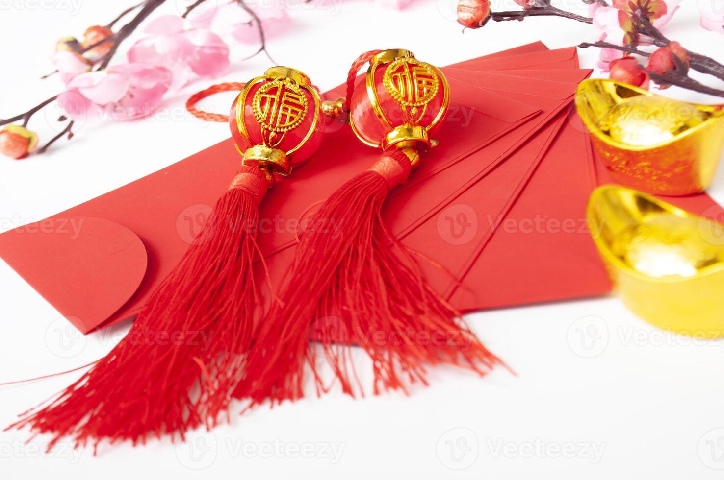 Chinese New Year red packet and golden ingot. Chinese New Year celebration concept photo