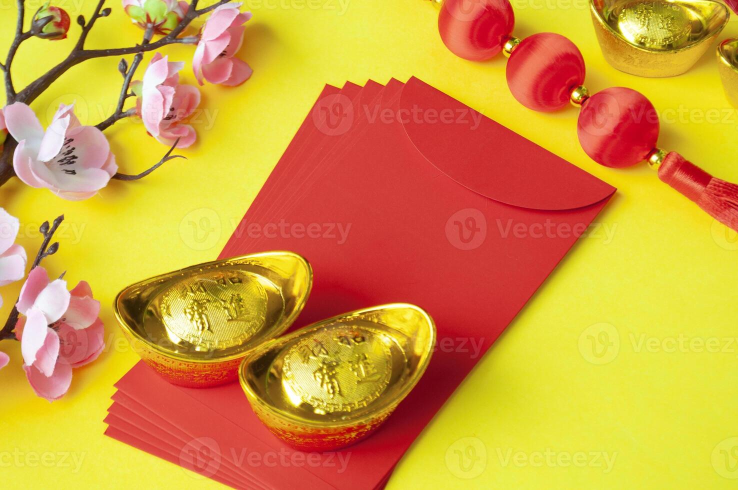 Top view of Chinese New Year decoration decoration on yellow cover background photo